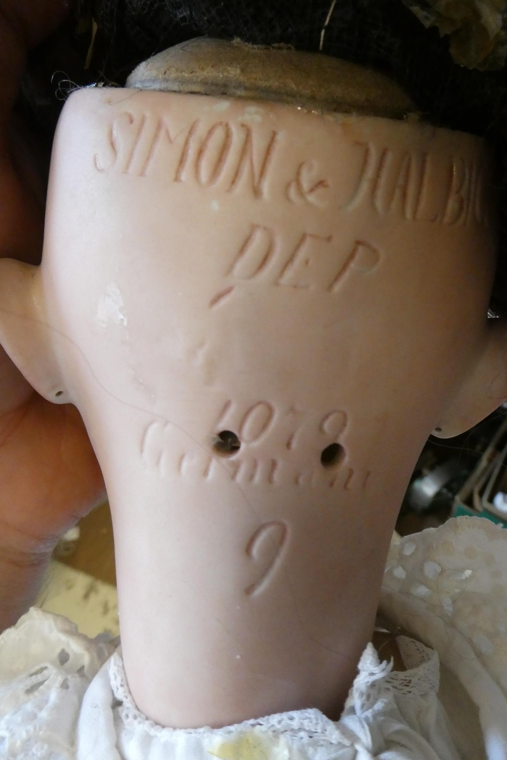 A Simon & Halbig bisque socket head doll Image