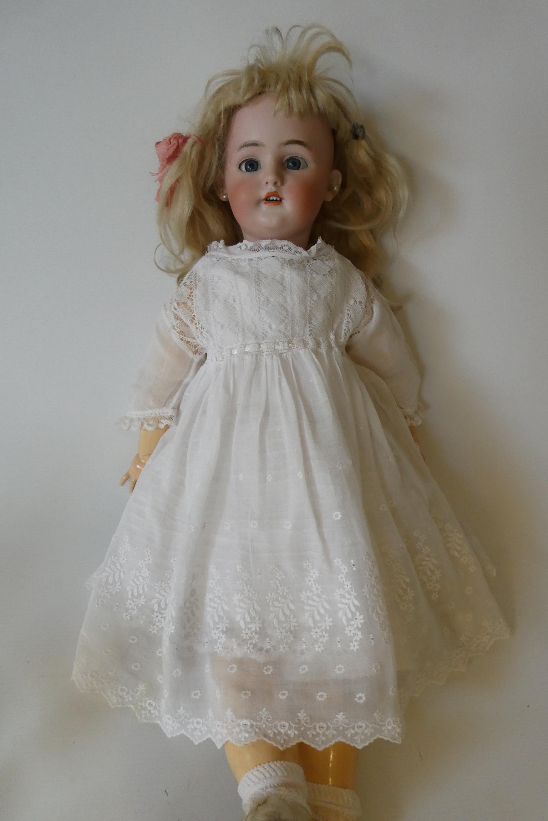 A Simon & Halbig bisque socket head doll Image