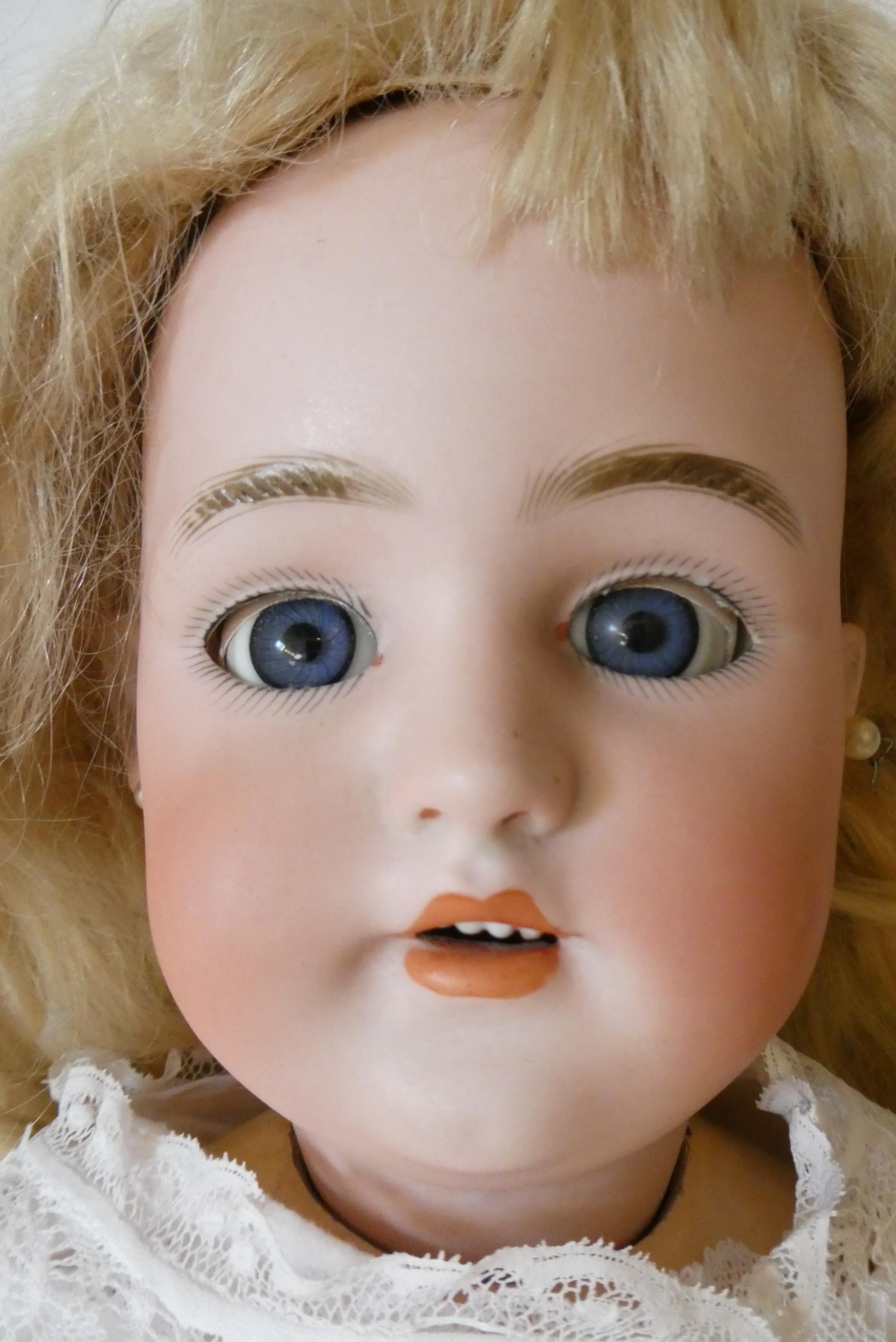 A Simon & Halbig bisque socket head doll Image