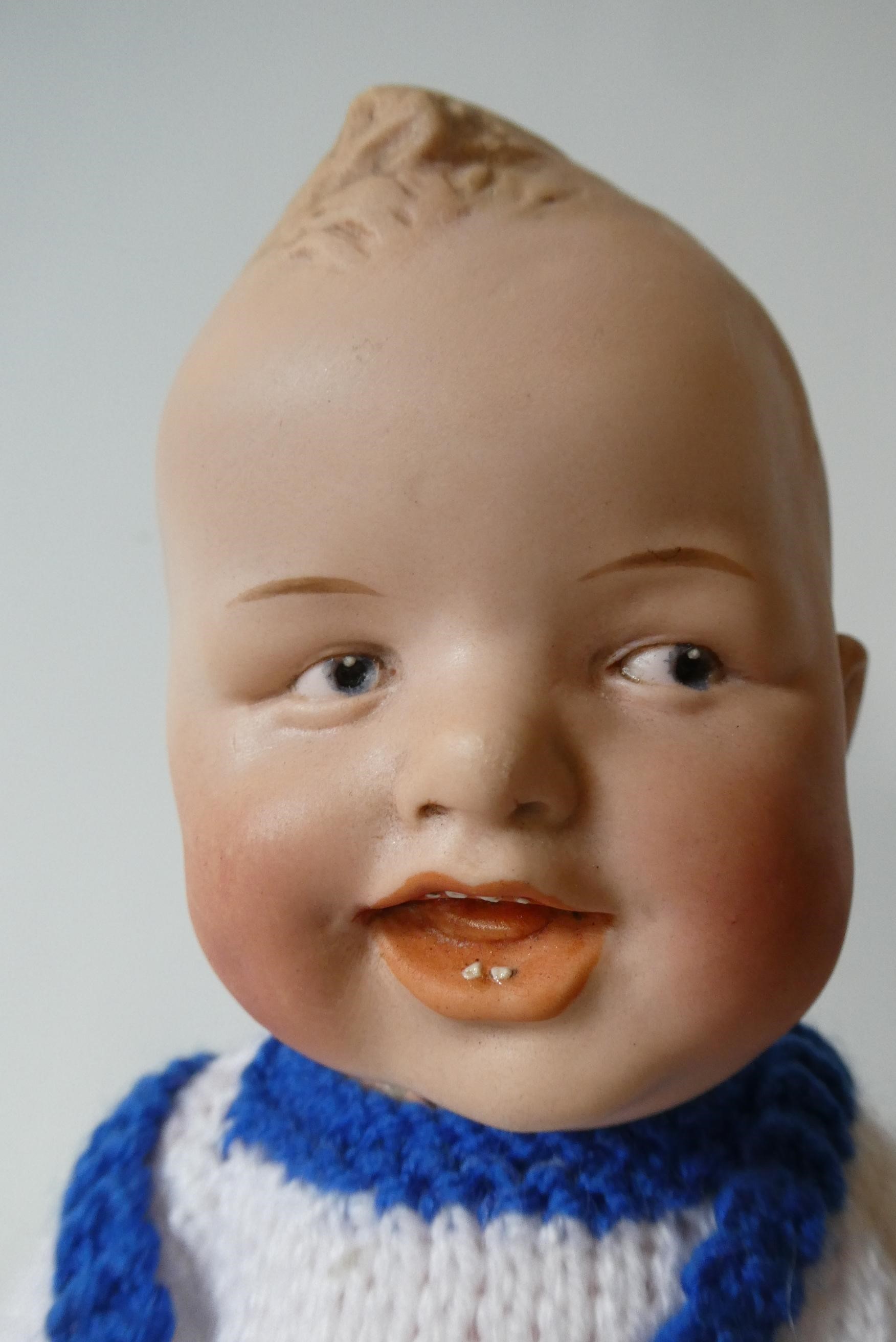 A Heubach bisque socket head character doll Image