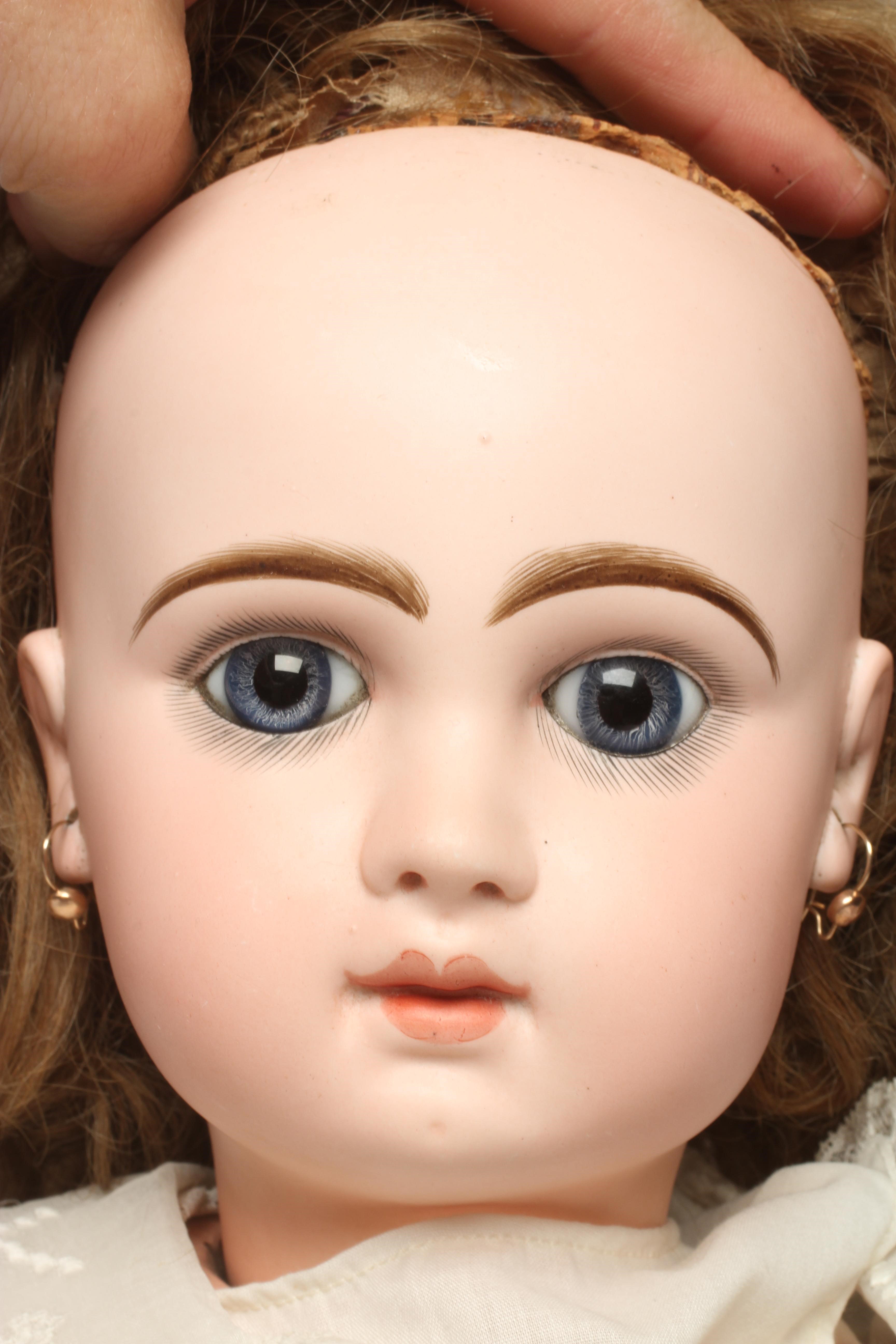 A Bebe Jumeau bisque socket head doll Image