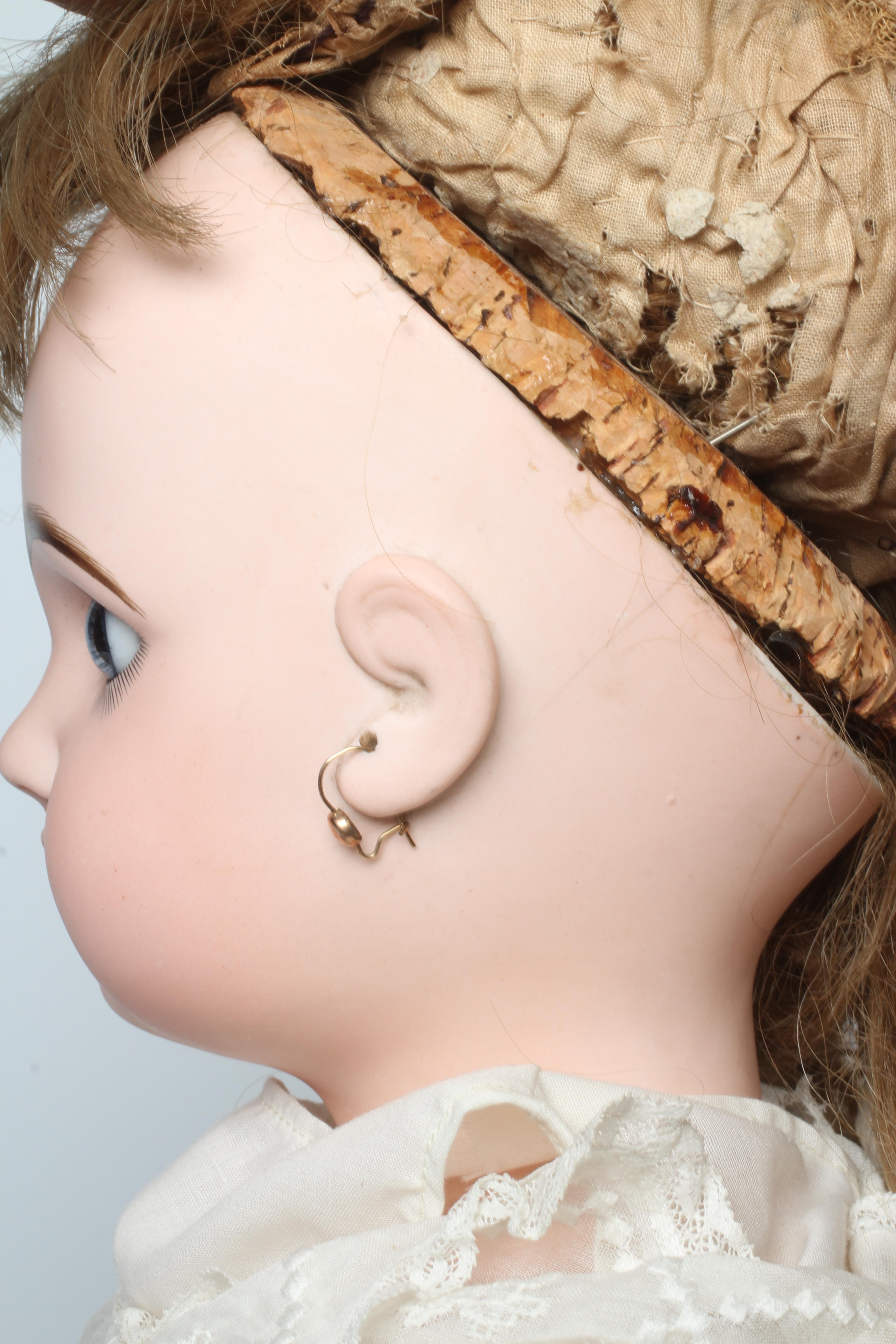 A Bebe Jumeau bisque socket head doll Image