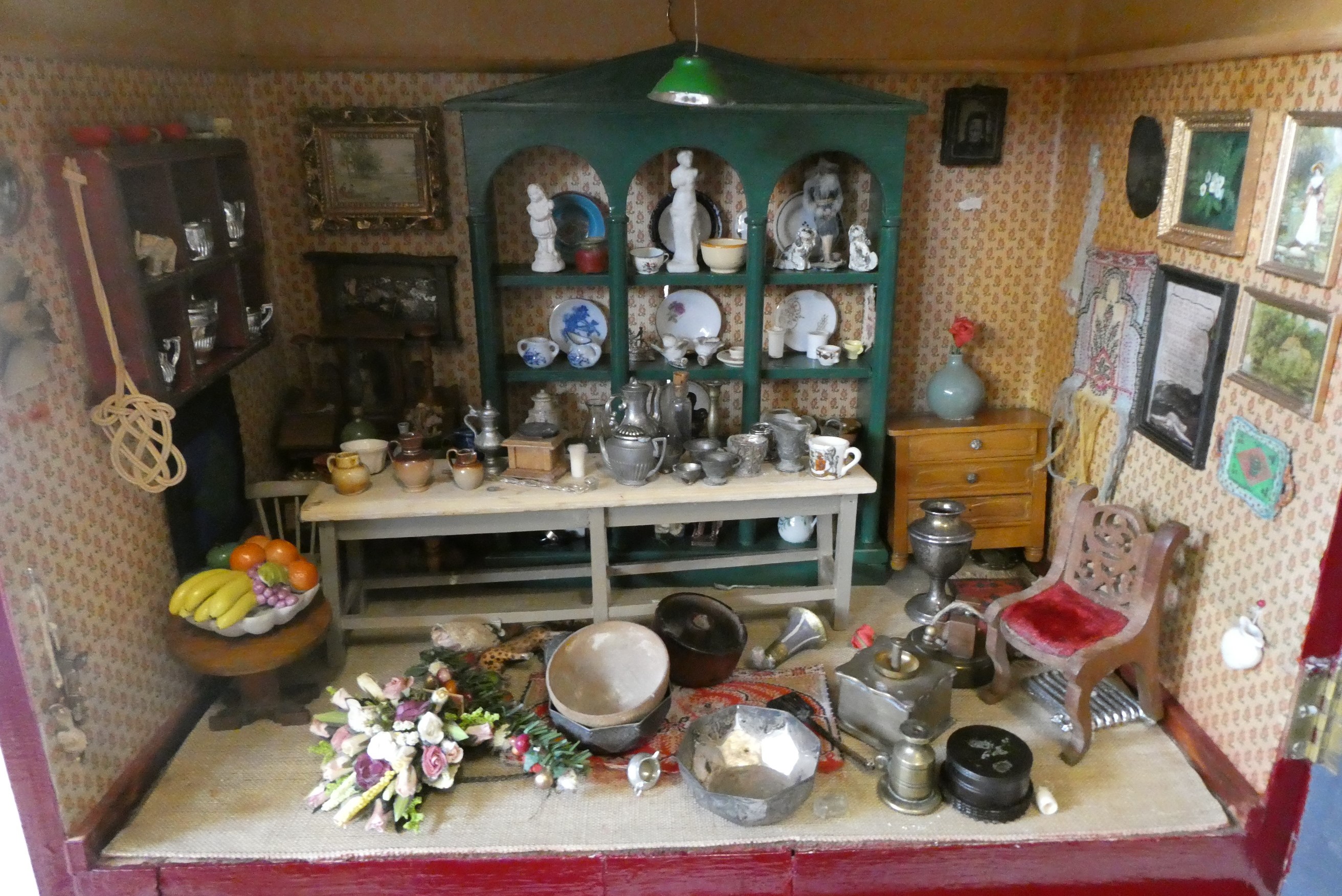 A doll's house and contents fitted as an antiques centre Image