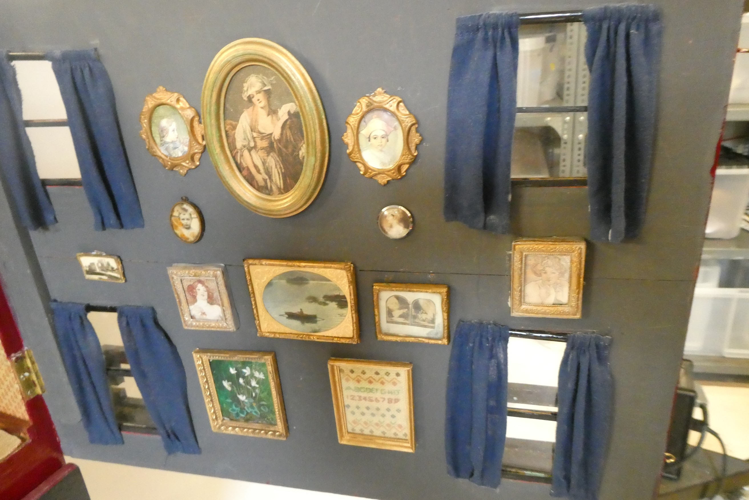 A doll's house and contents fitted as an antiques centre Image