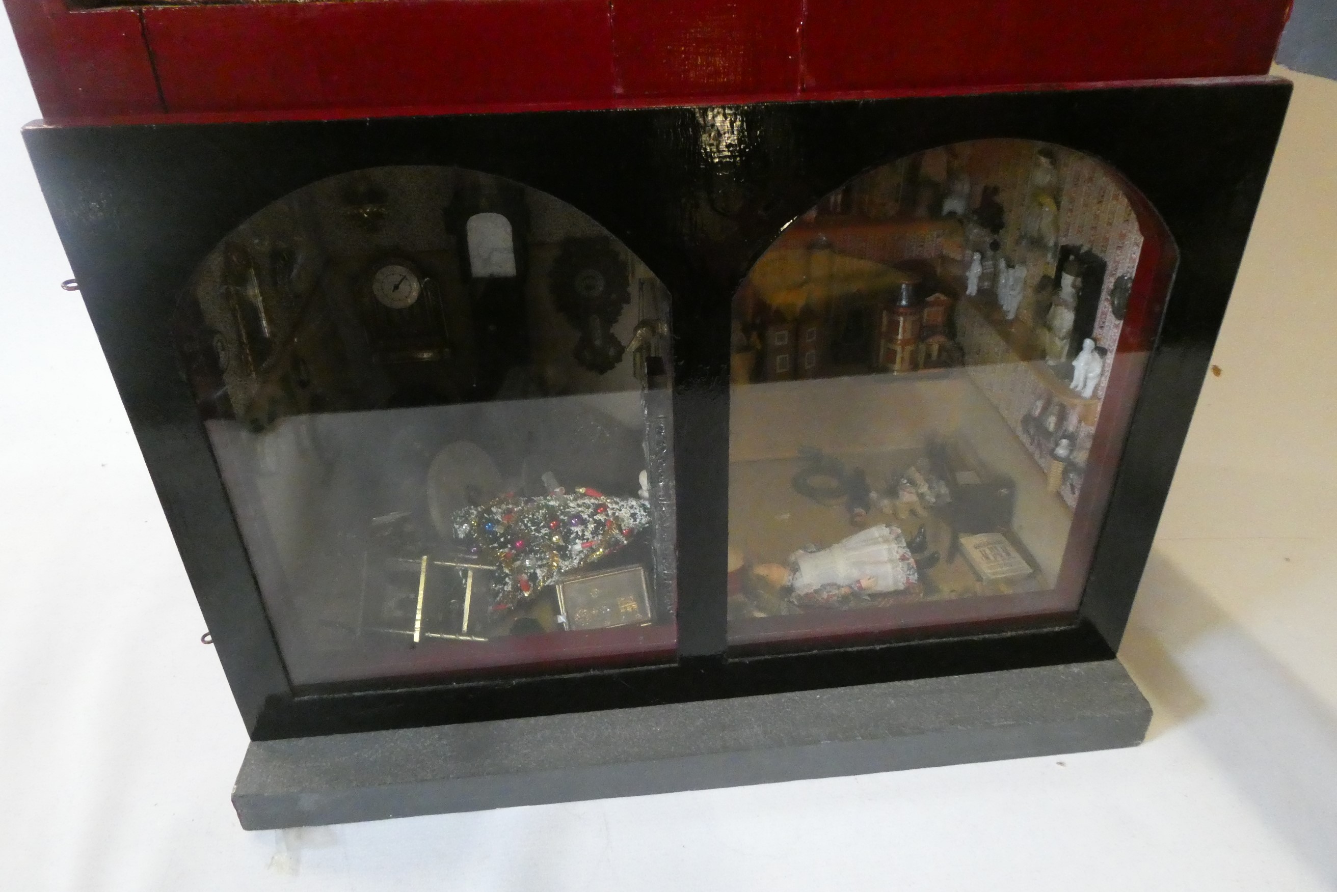 A doll's house and contents fitted as an antiques centre Image
