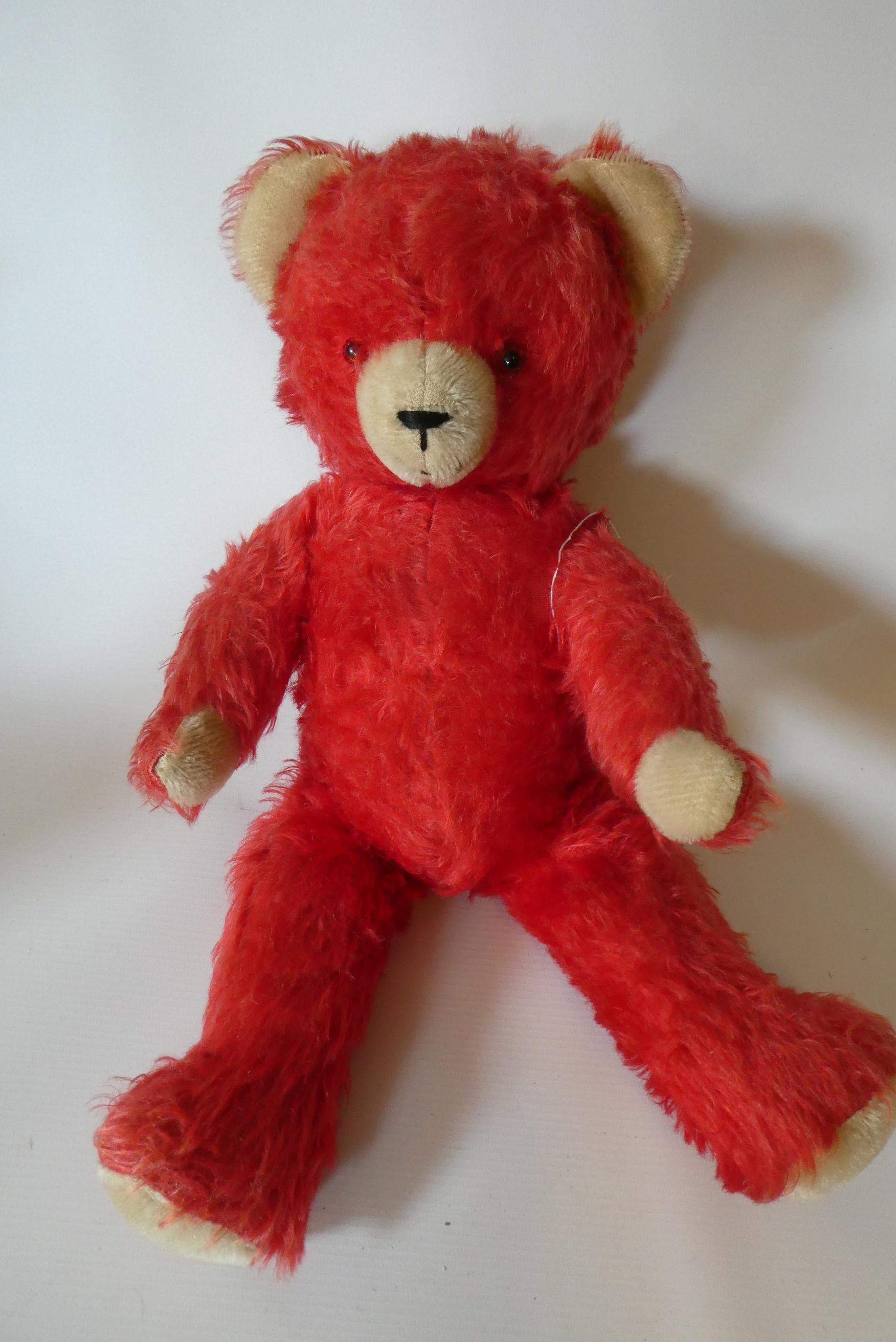 German red jointed teddy bear, with glass eyes, sewn nose, cream ears, nose and pads, 17" long (Est. Image
