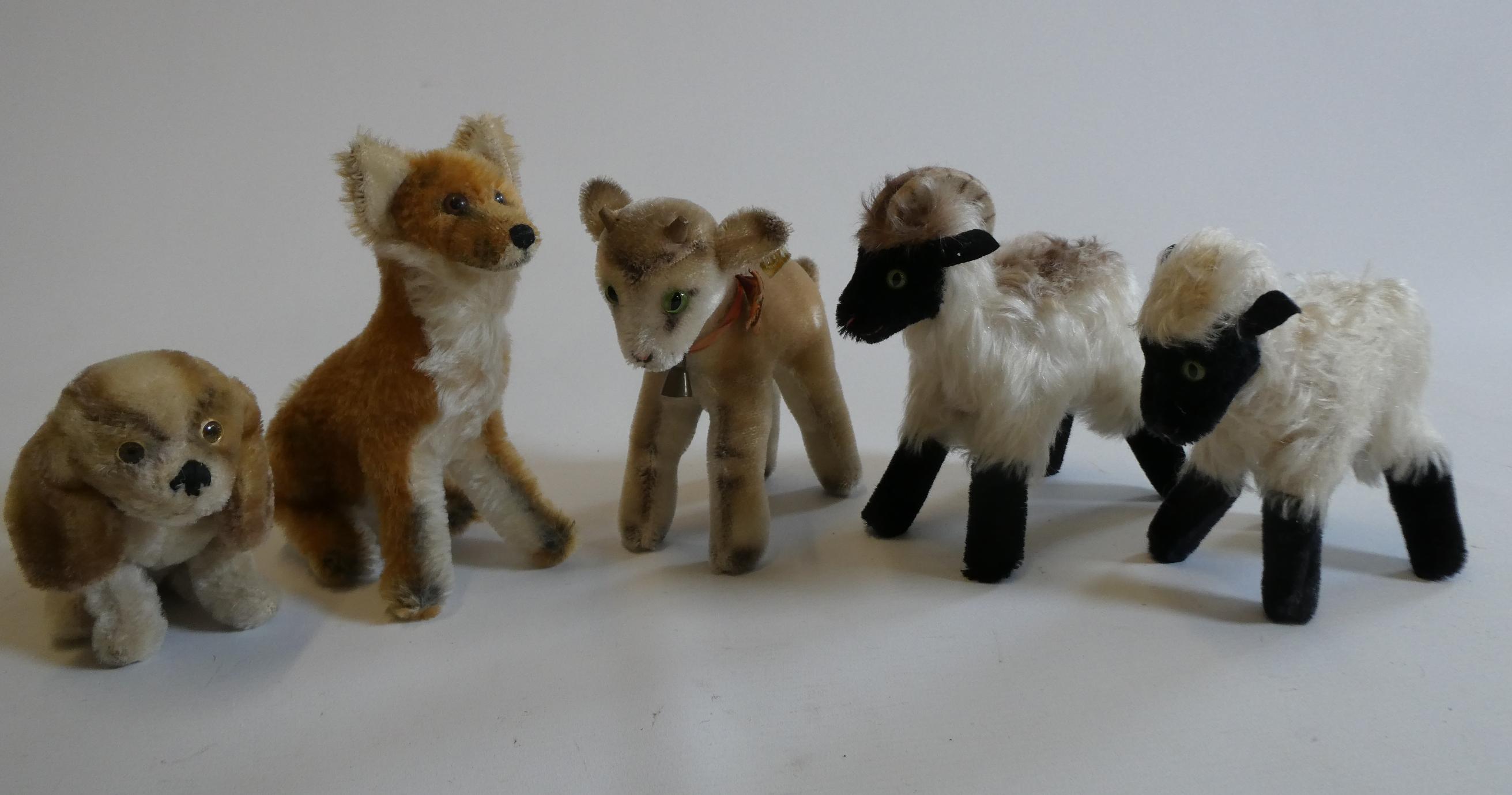 Five Steiff animals, comprising a fox, a goat, a puppy, a sheep and a lamb, largest 8" (Est. plus Image