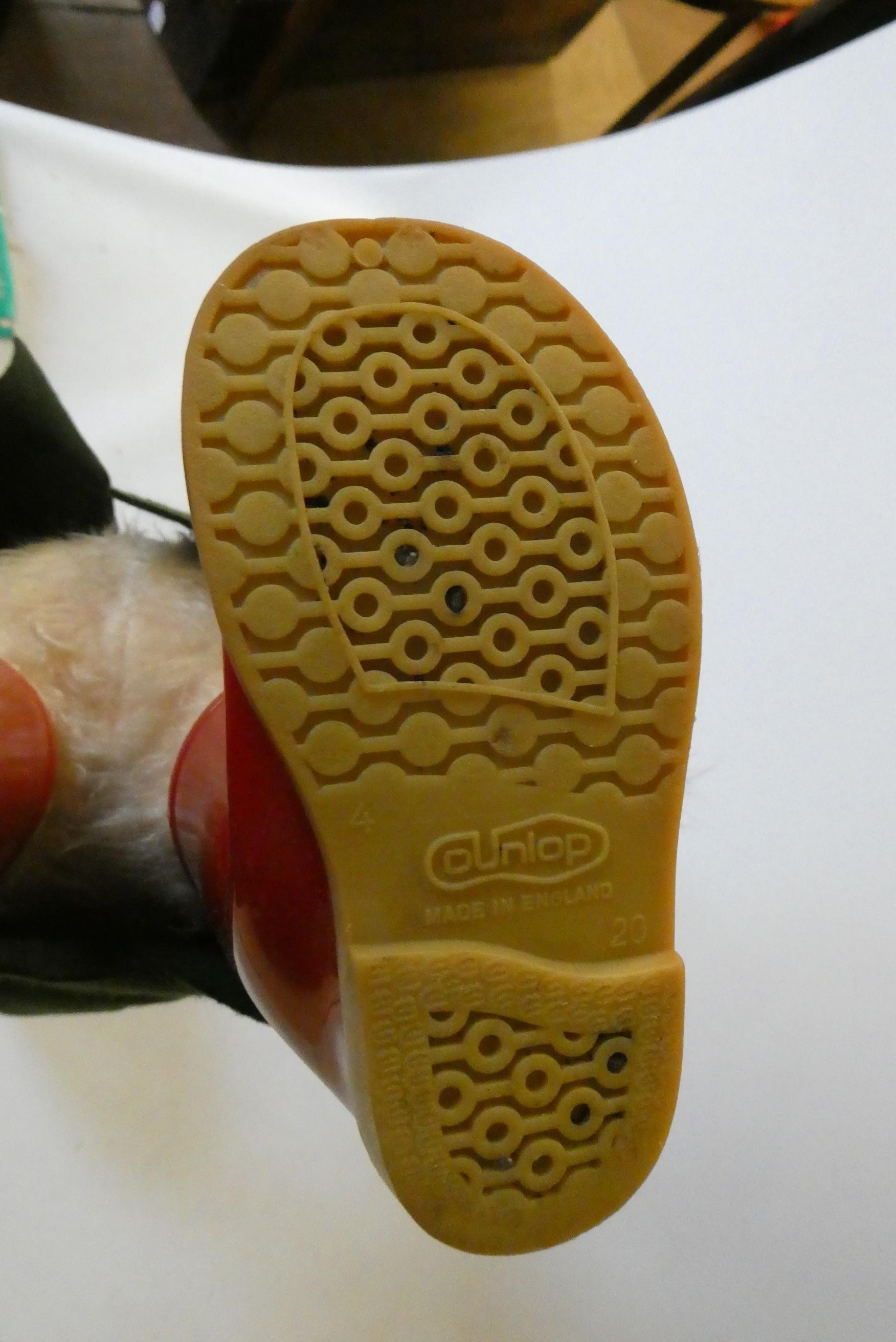 Vintage Paddington bear, with green felt coat, red felt hat, red Dunlop boots and tag, 18" (Est. Image