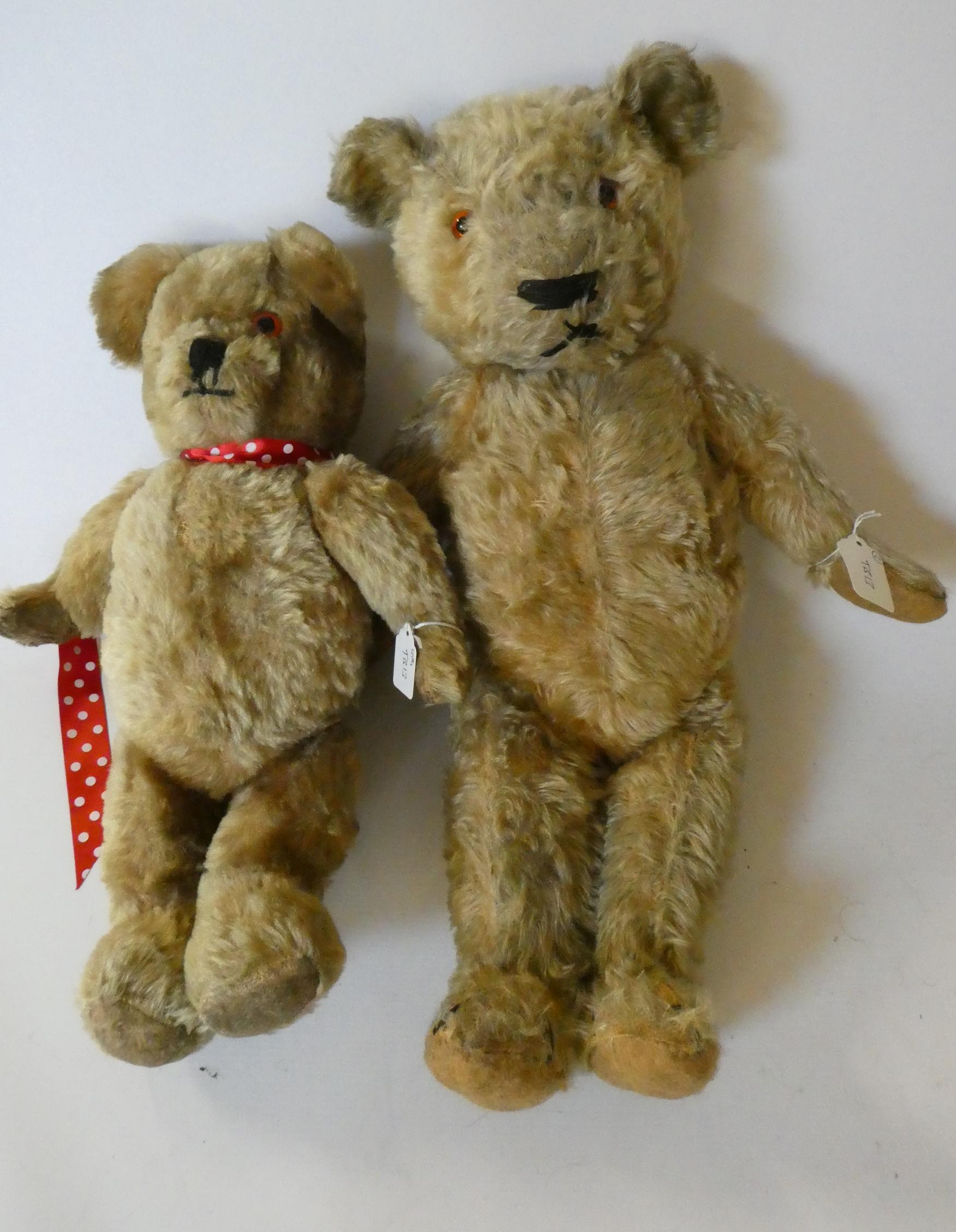 Two vintage English teddy bears, comprising a 22 1/2" orange plush growling bear with amber eyes, Image