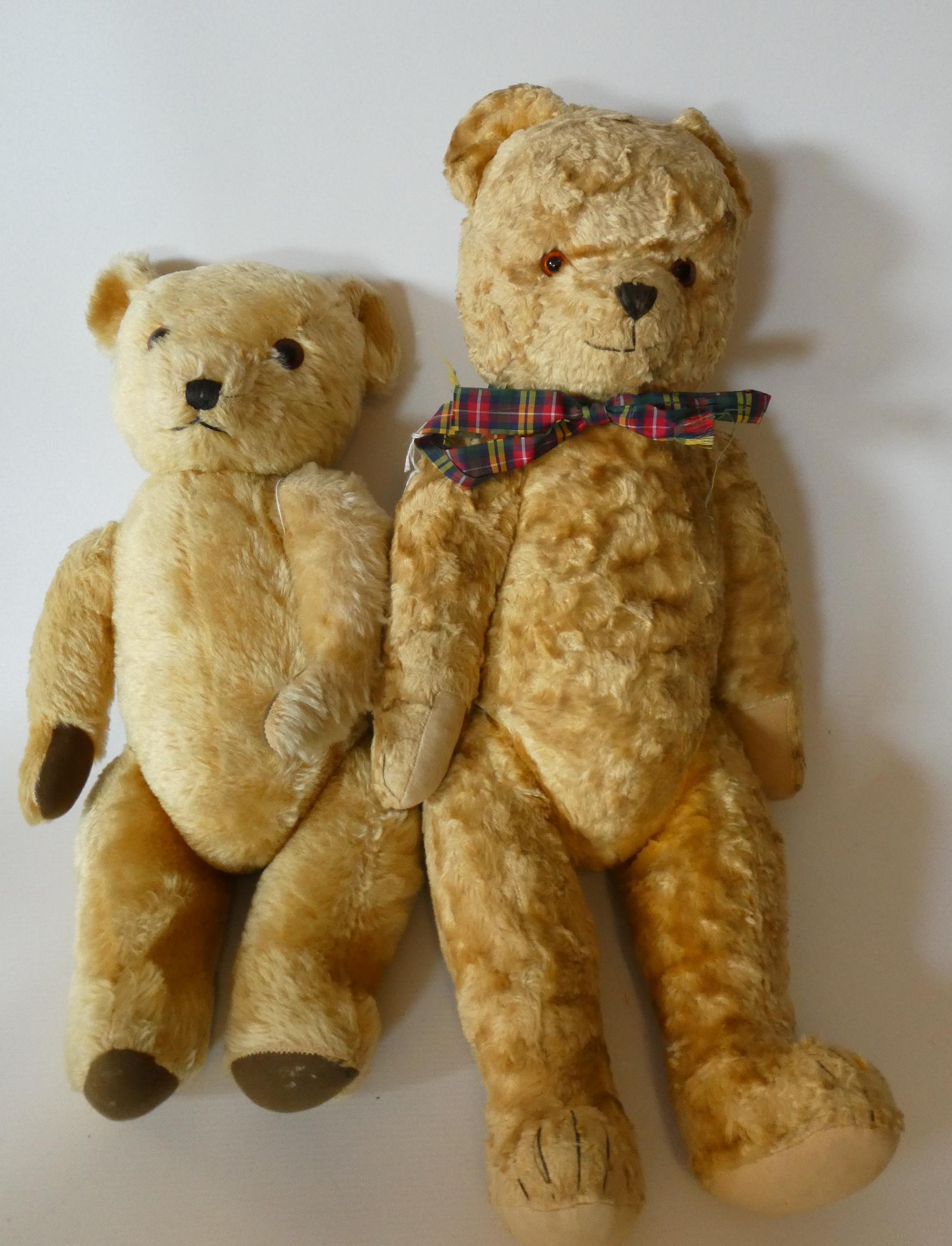 Two vintage jointed teddy bears comprising a 24" curly haired growling bear, with amber glass eyes, Image