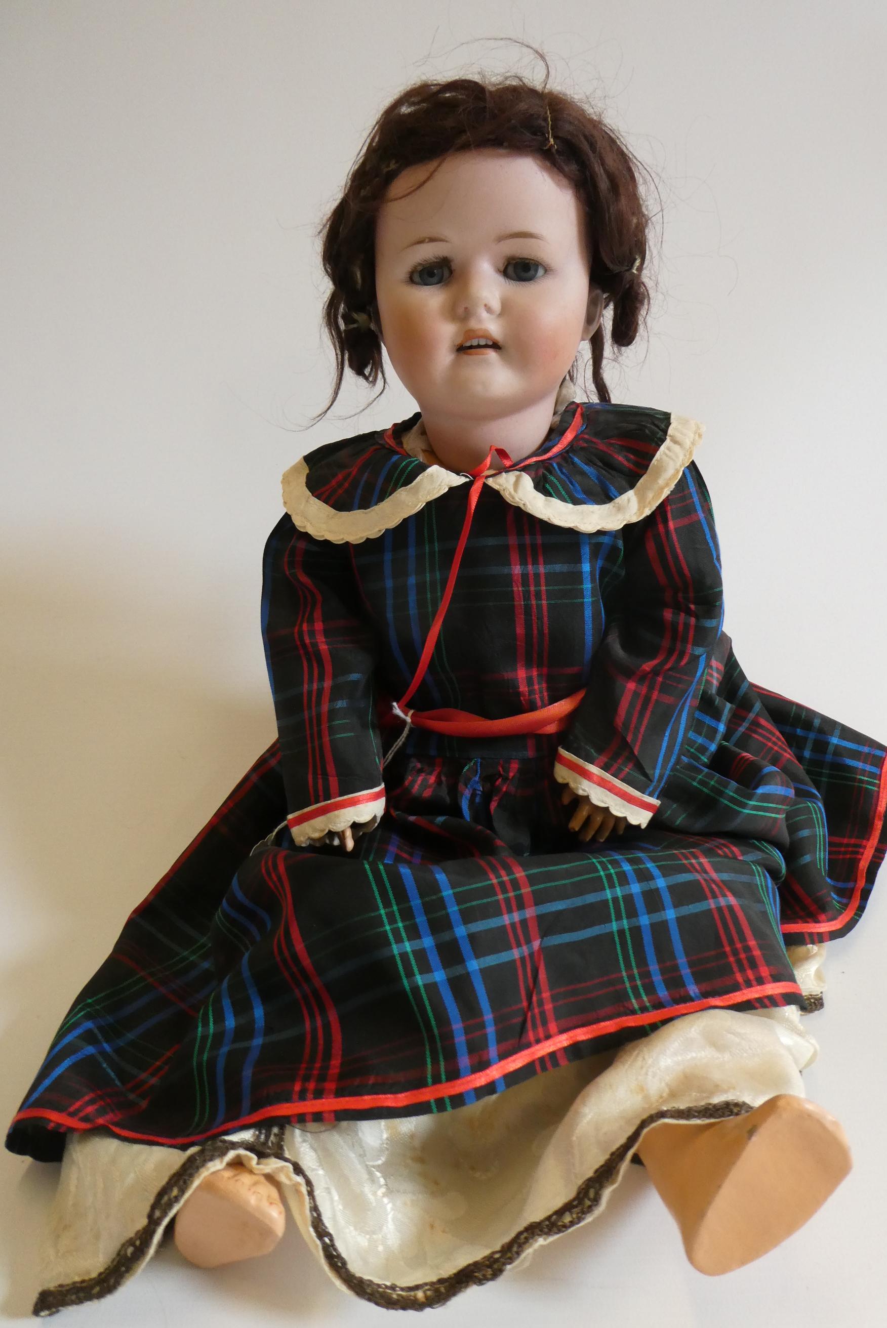 A Max Handwerk "Bebe Elite" bisque socket head doll with brown glass sleeping eyes Image