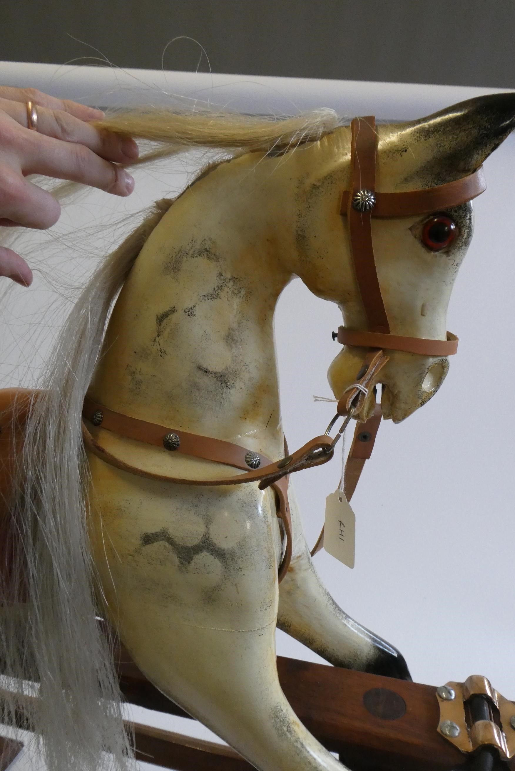 A dappled grey rocking horse Image
