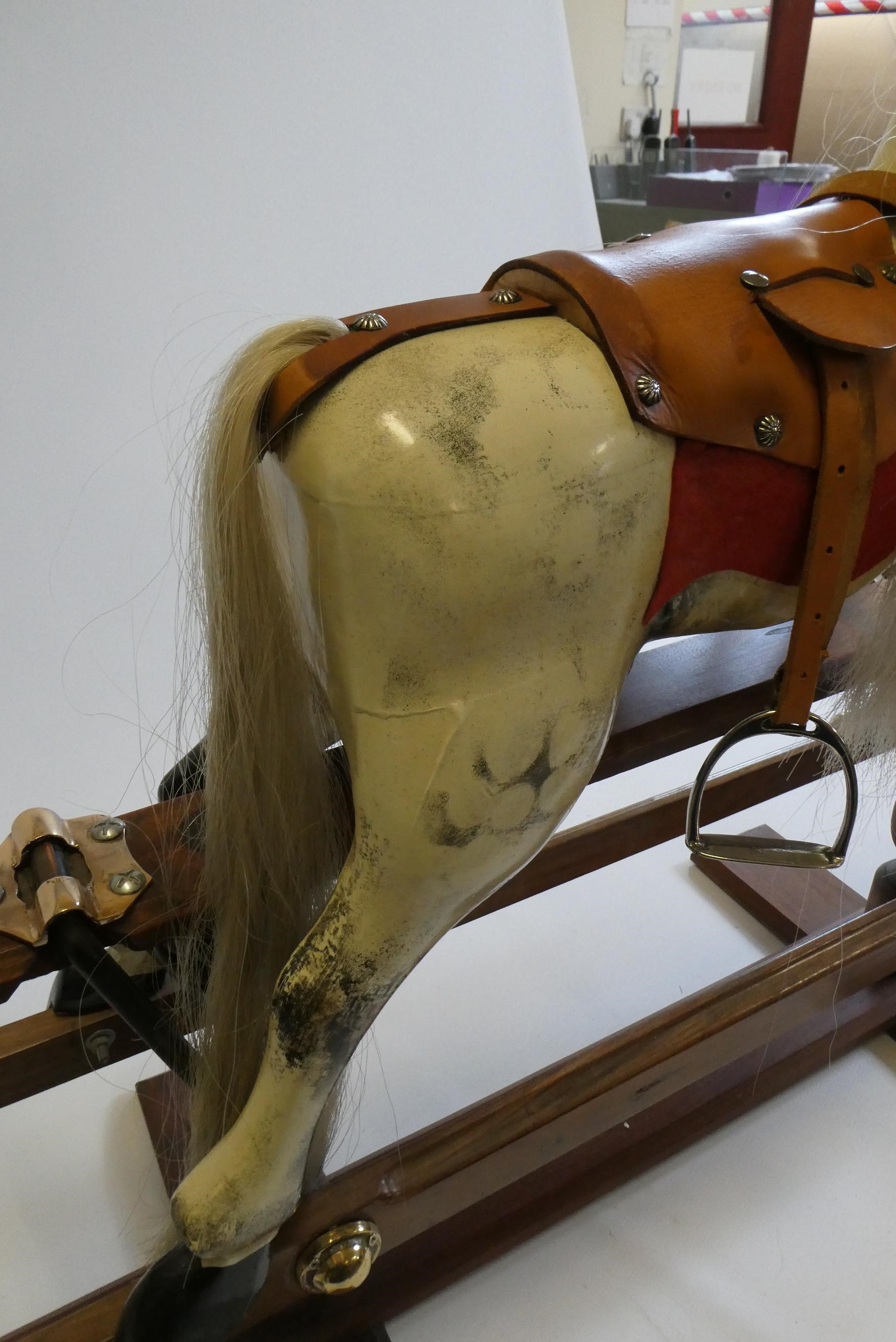 A dappled grey rocking horse Image
