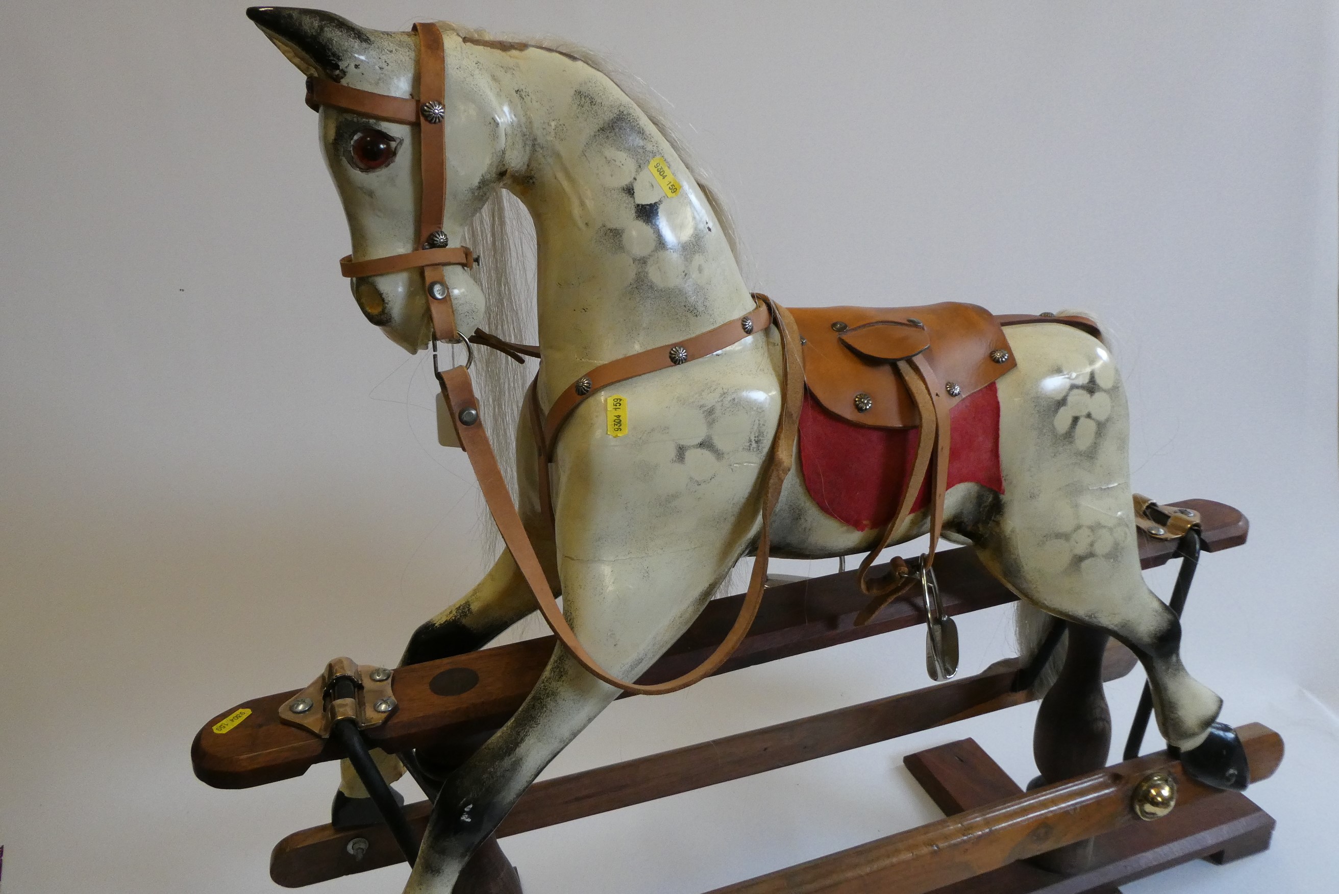 A dappled grey rocking horse Image