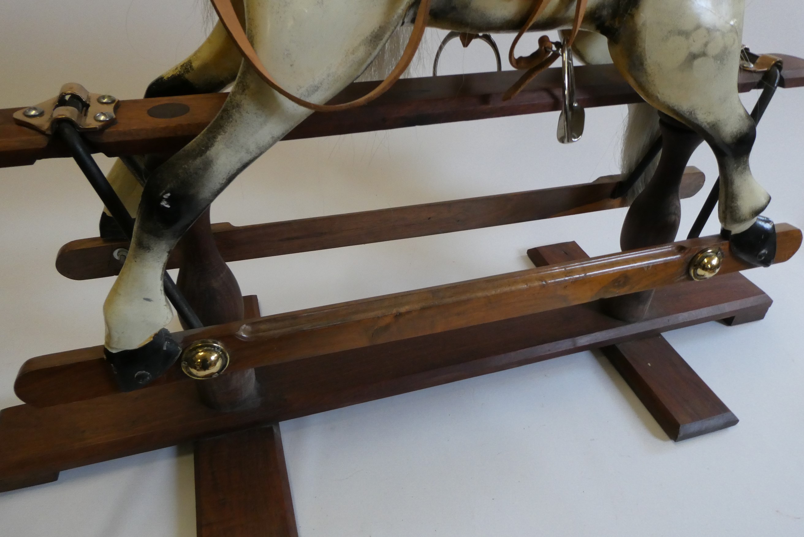 A dappled grey rocking horse Image