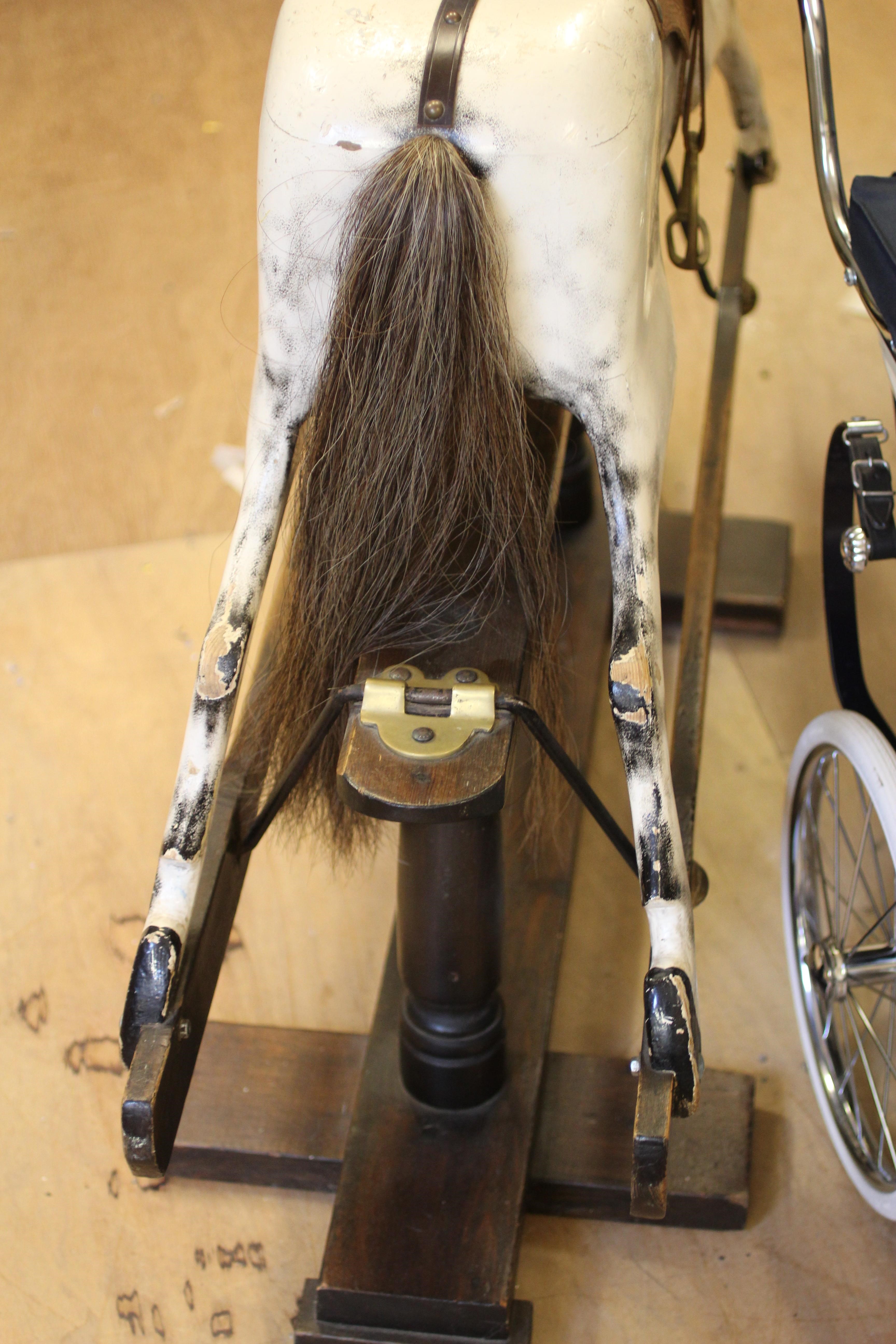 A dappled grey rocking horse Image