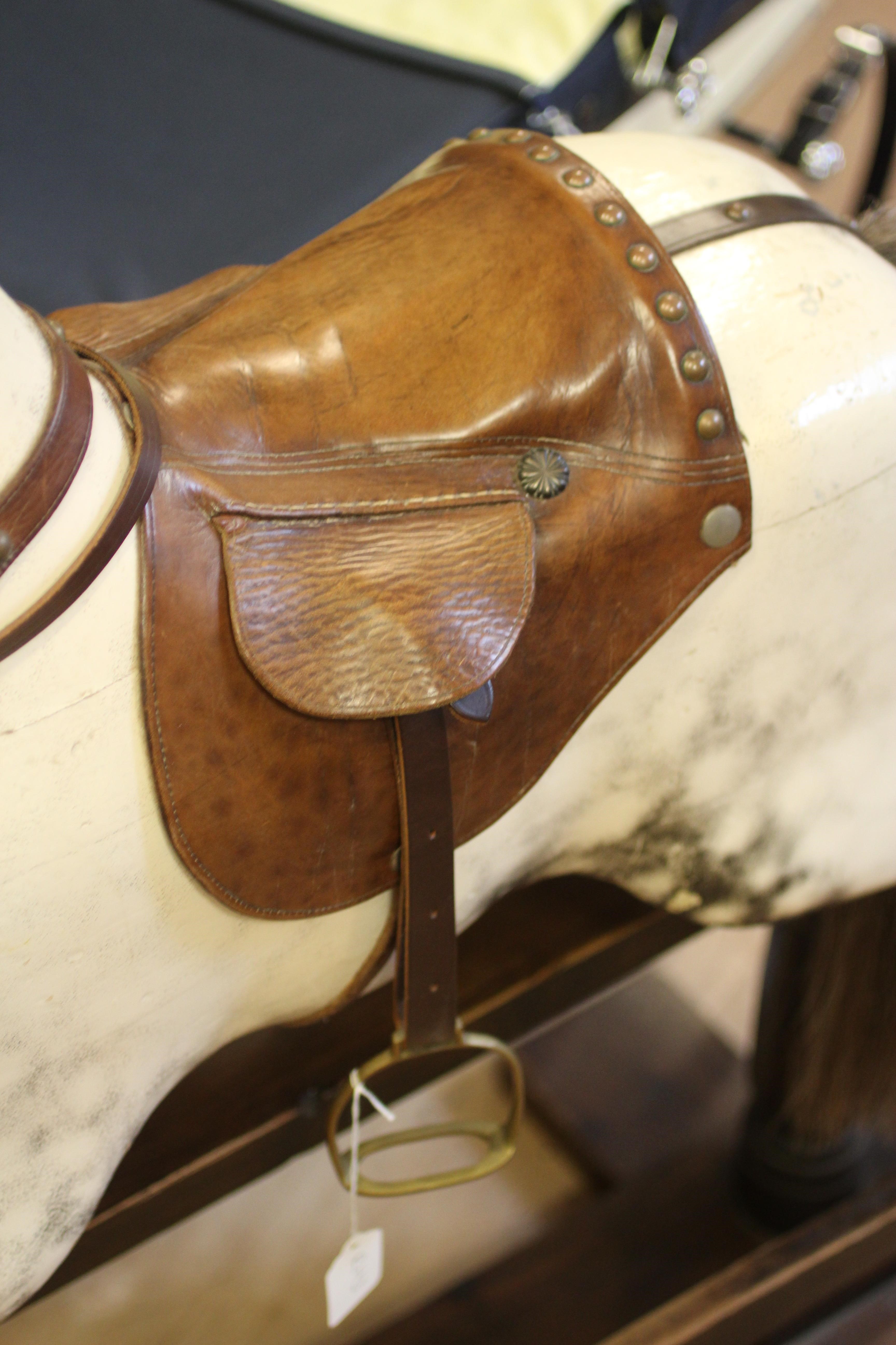 A dappled grey rocking horse Image