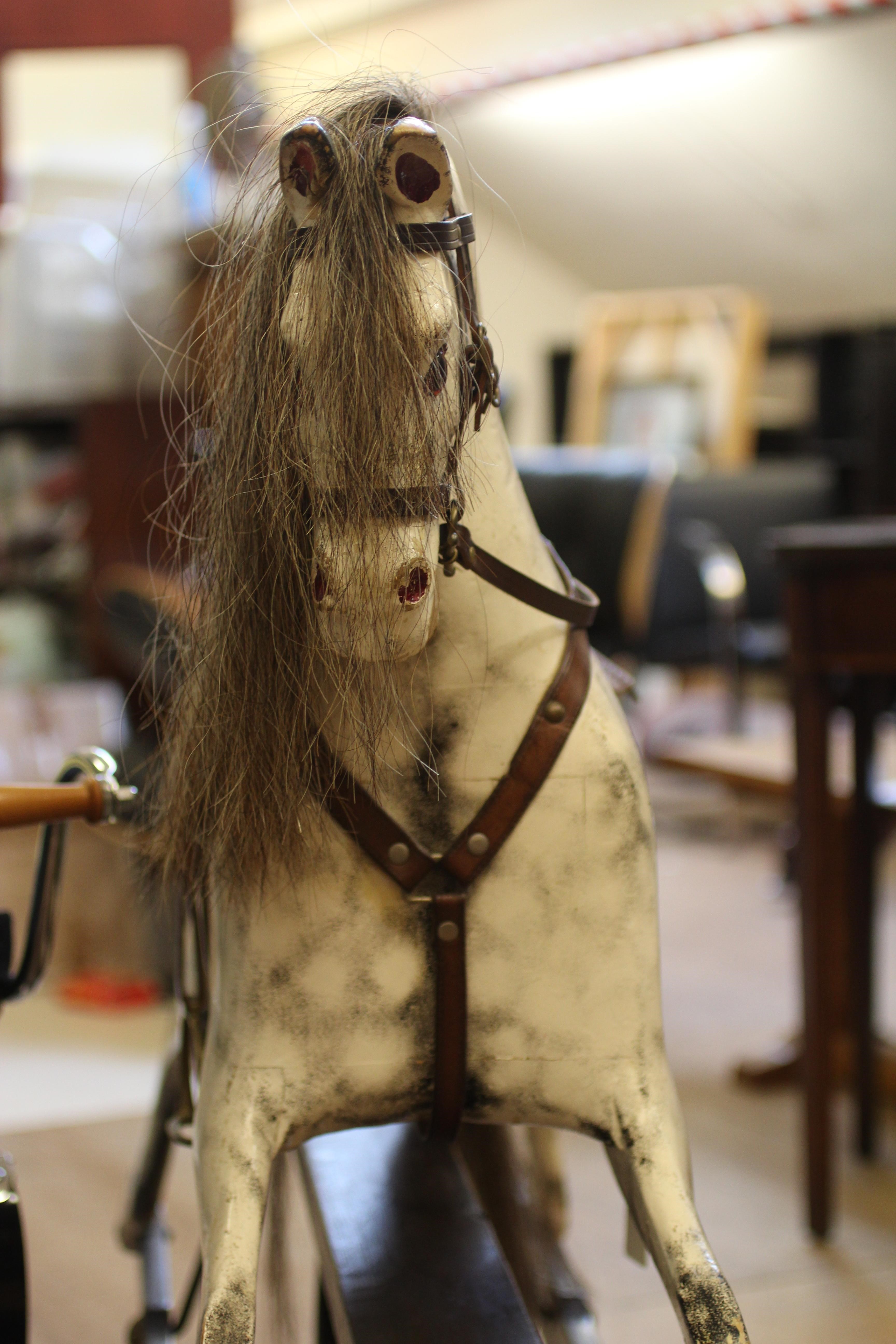 A dappled grey rocking horse Image