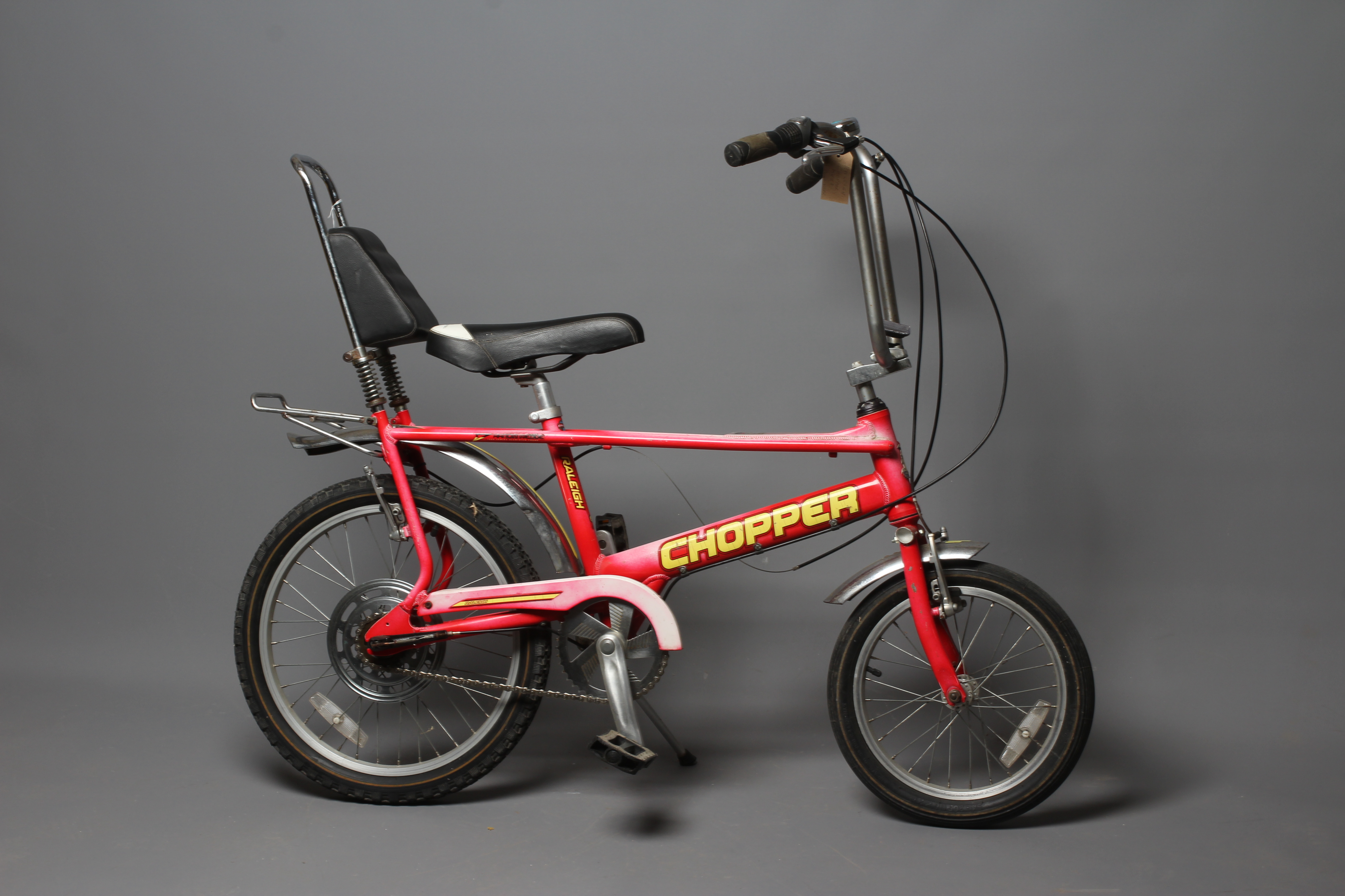 A Raleigh Chopper Mk III, in rare hazy red colour, 17" rim diameter, with Alan Watson shop label, Image
