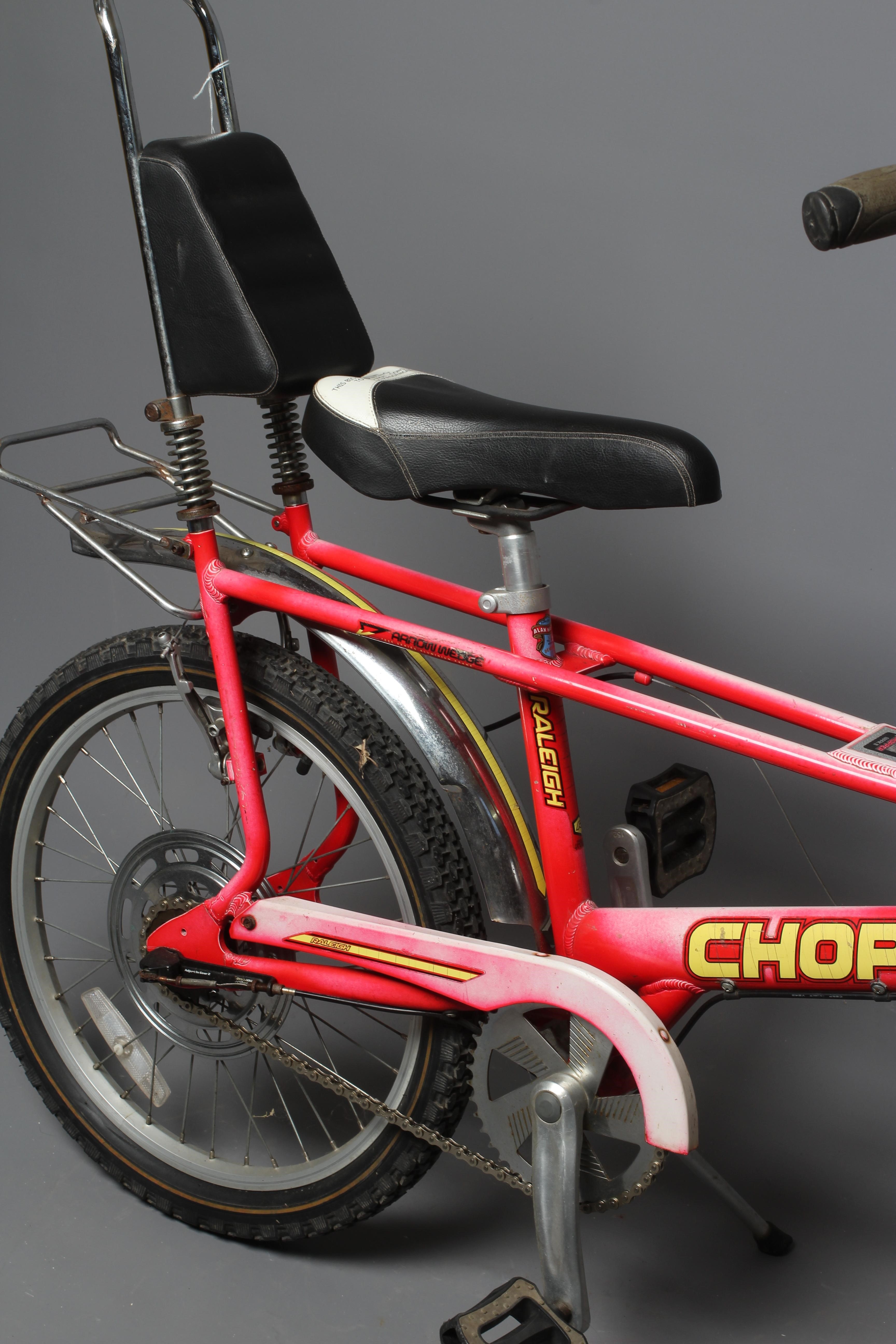 A Raleigh Chopper Mk III, in rare hazy red colour, 17" rim diameter, with Alan Watson shop label, Image