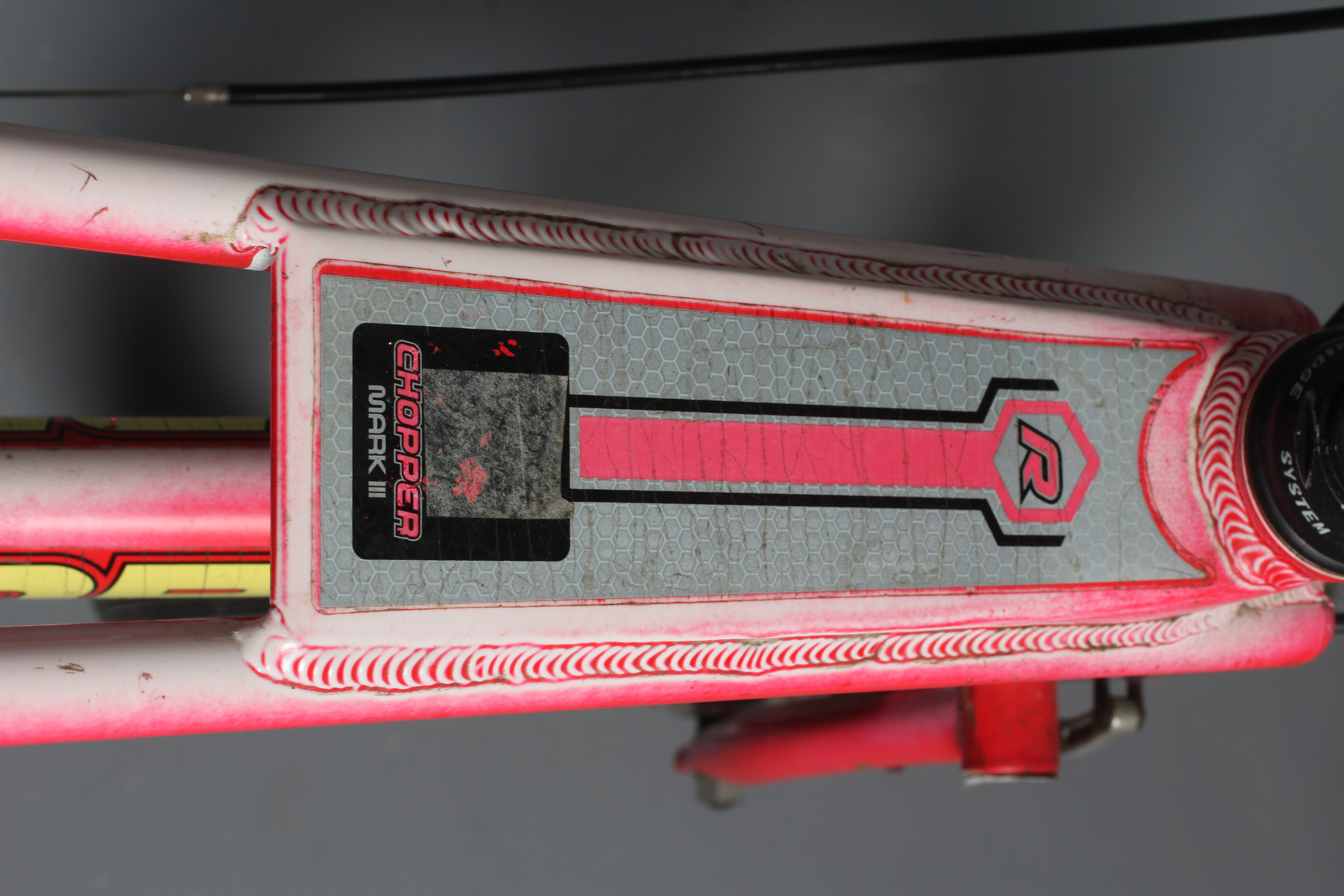 A Raleigh Chopper Mk III, in rare hazy red colour, 17" rim diameter, with Alan Watson shop label, Image