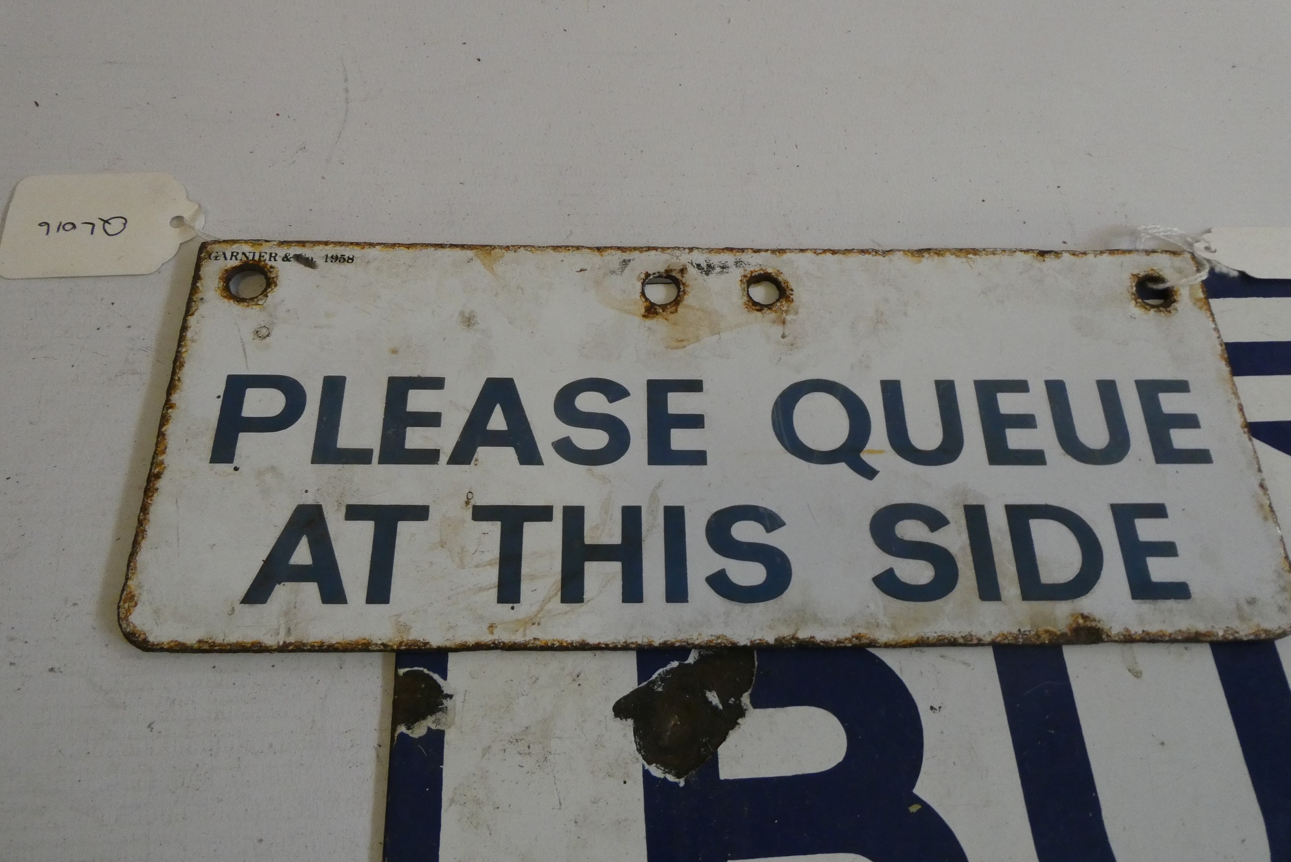 Enamel BCT bus stop sign, by Garnier & Co. 1967, together with an enamel "please queue at this side" Image