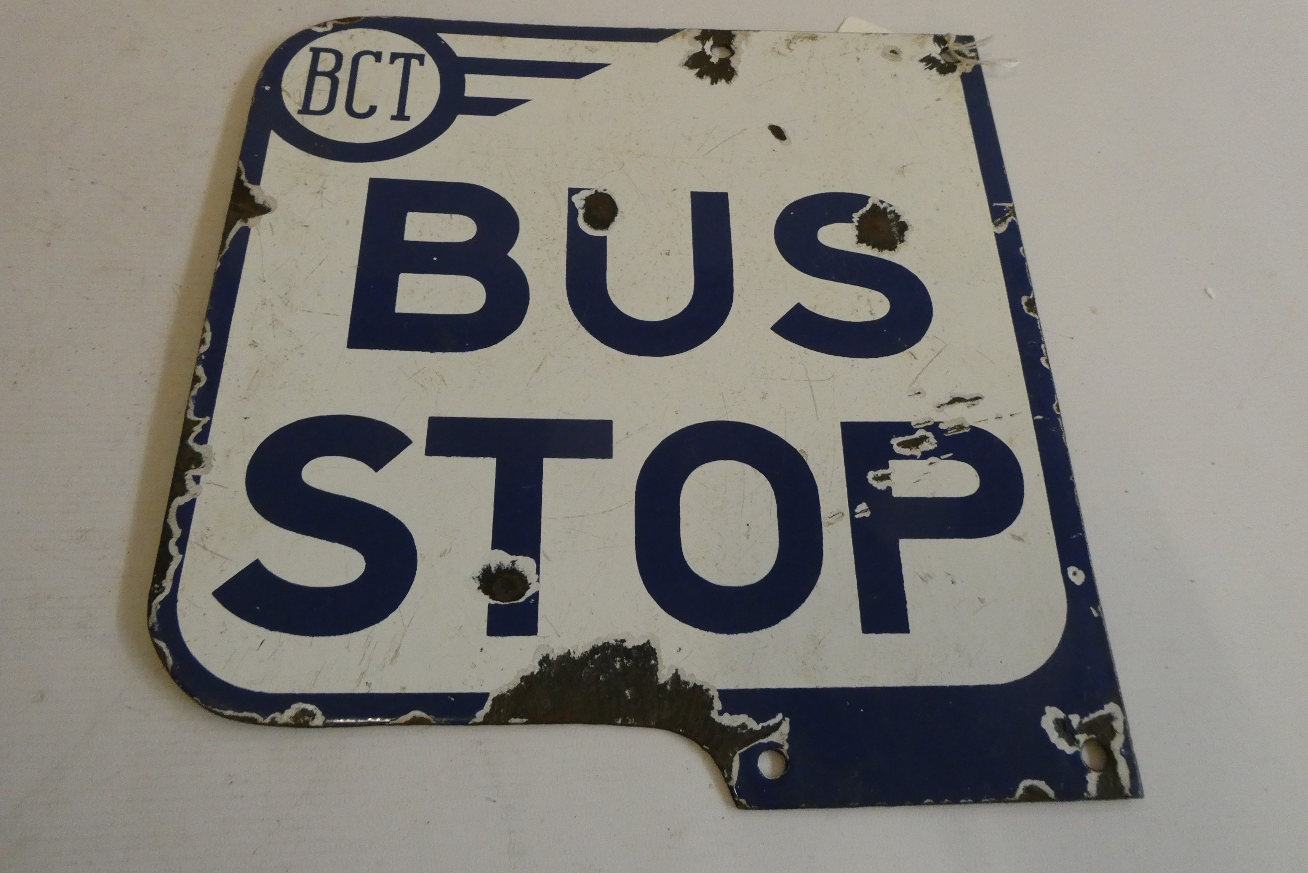 Enamel BCT bus stop sign, by Garnier & Co. 1967, together with an enamel "please queue at this side" Image