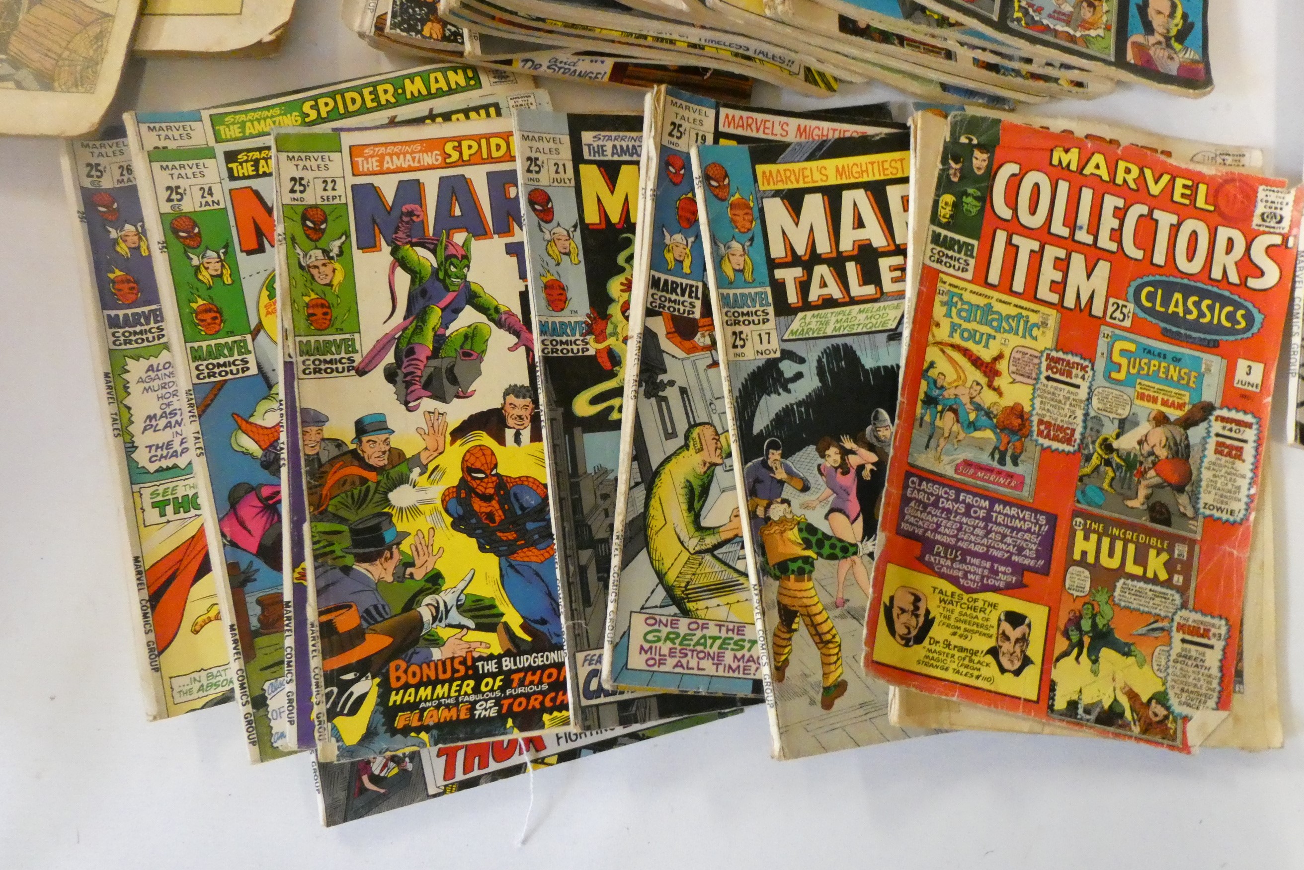 A box of assorted comics and annuals Image