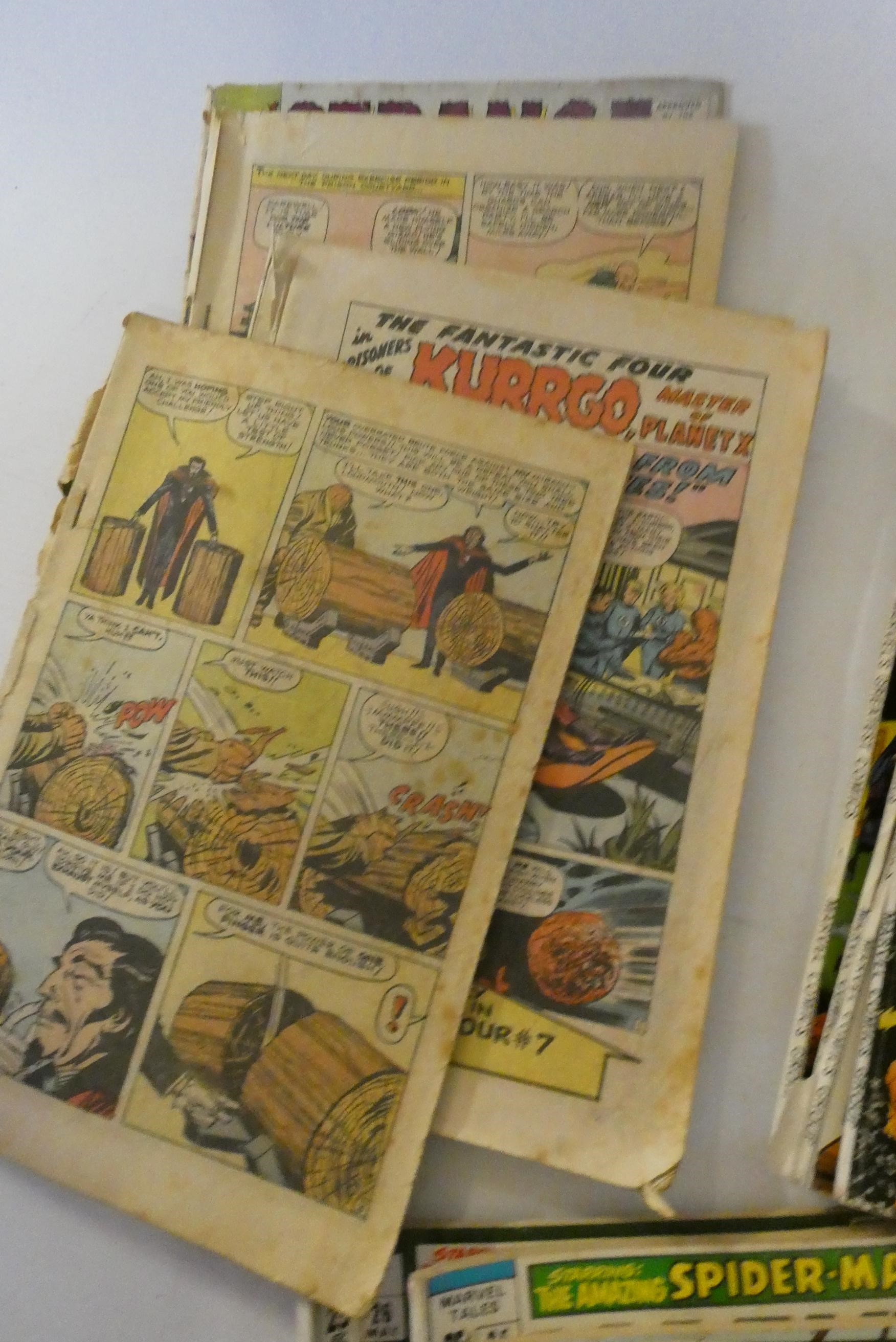 A box of assorted comics and annuals Image