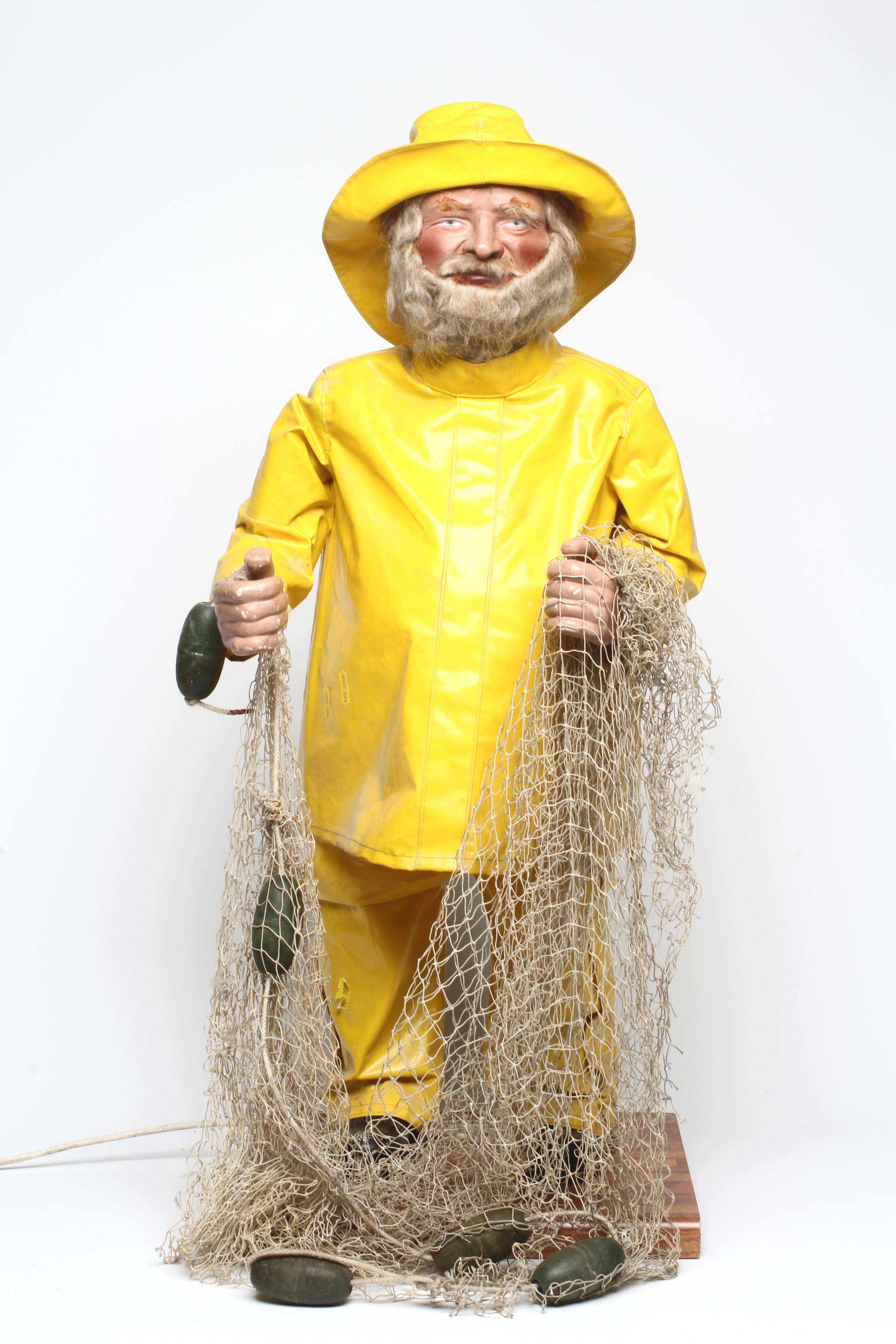 A J. H. Animations automaton of a fisherman with composite hands and face Image