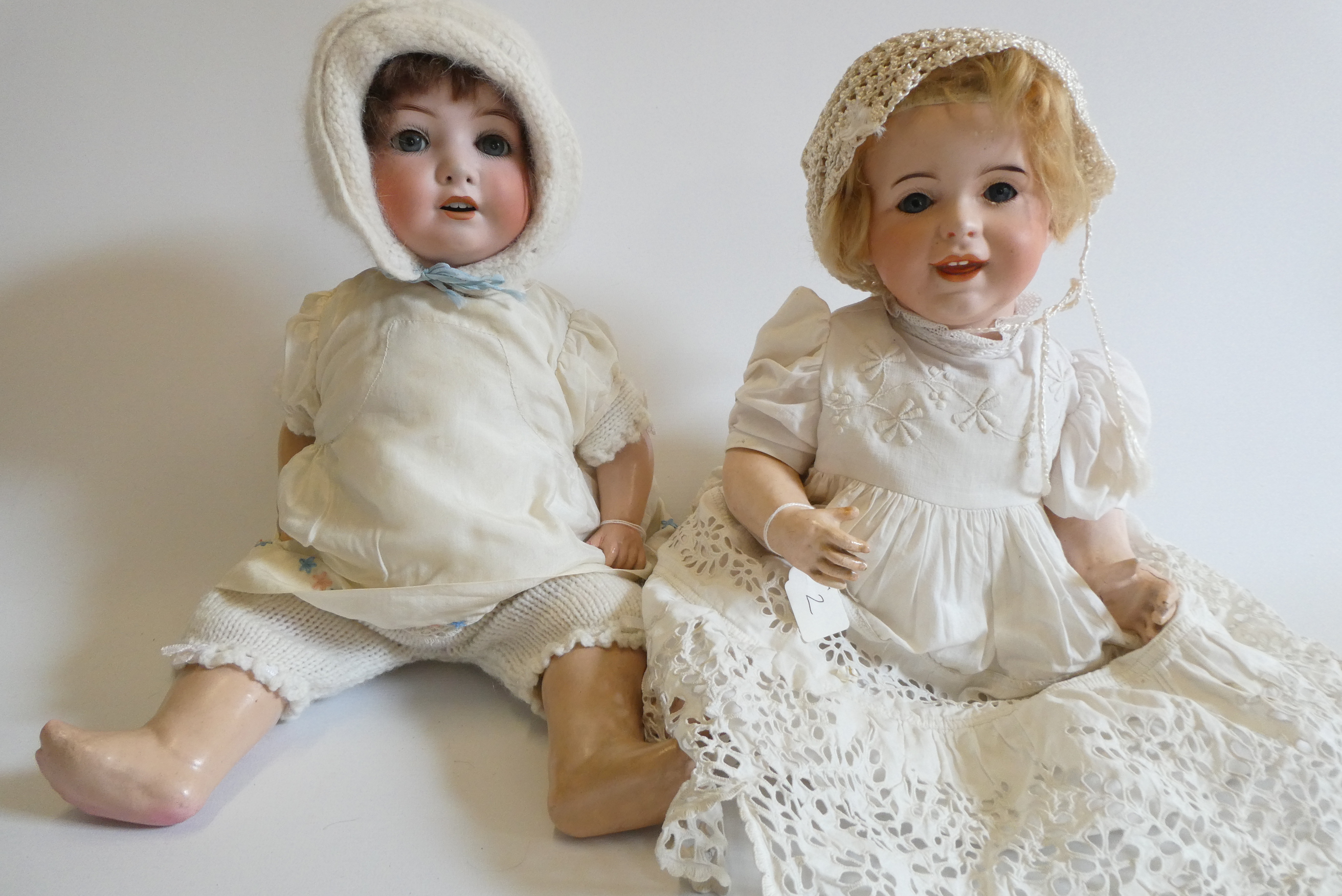 Two bisque socket head dolls Image