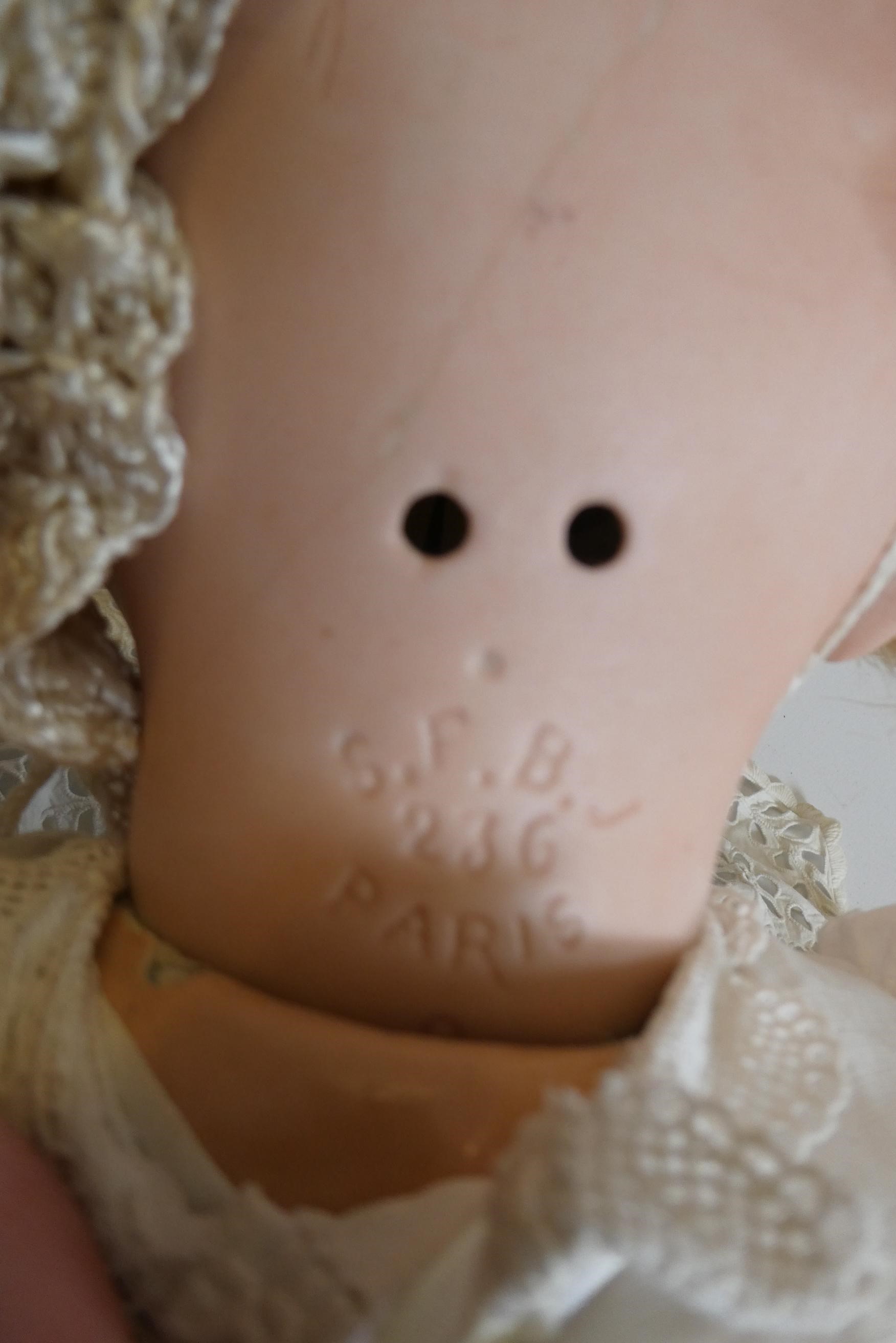 Two bisque socket head dolls Image