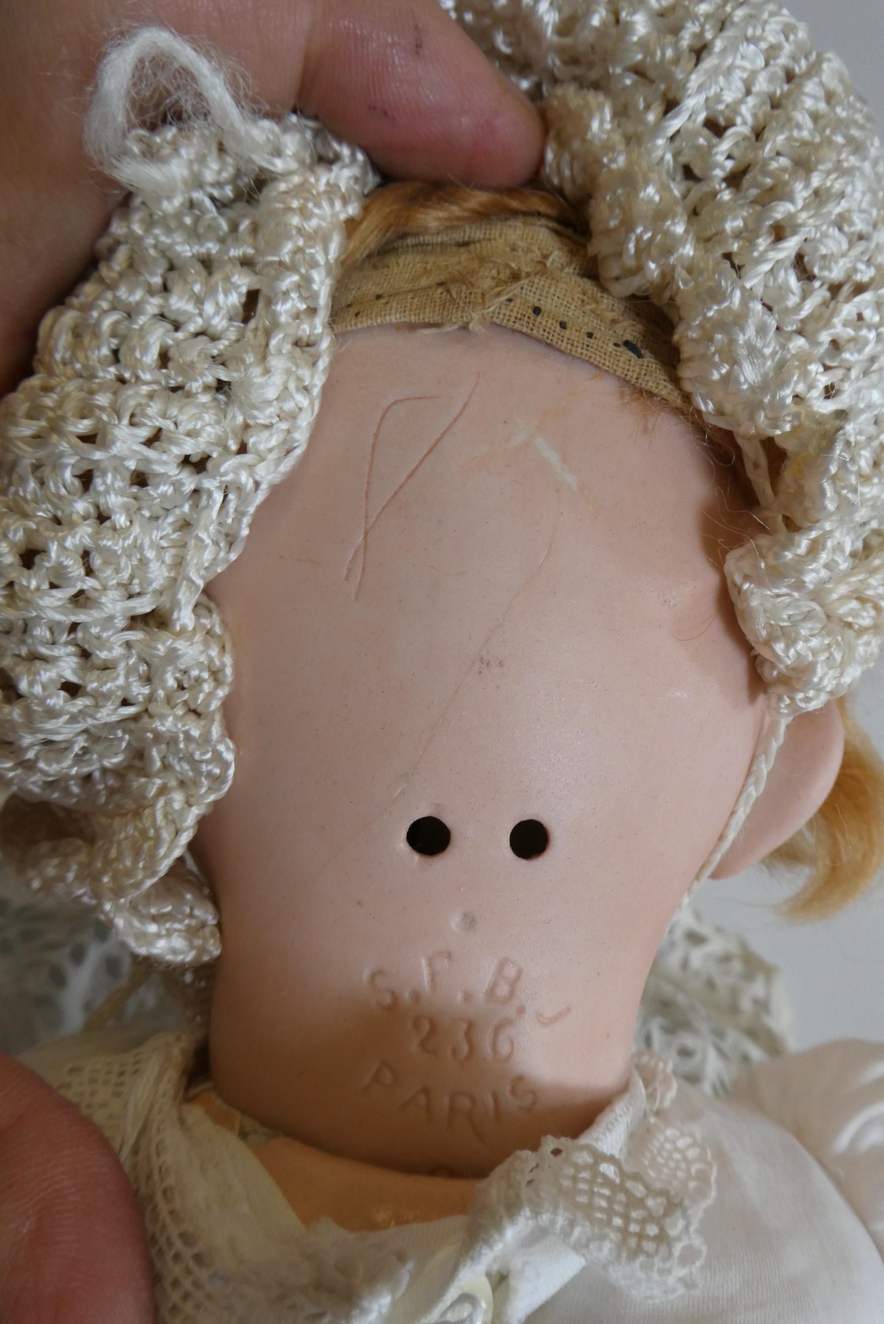 Two bisque socket head dolls Image