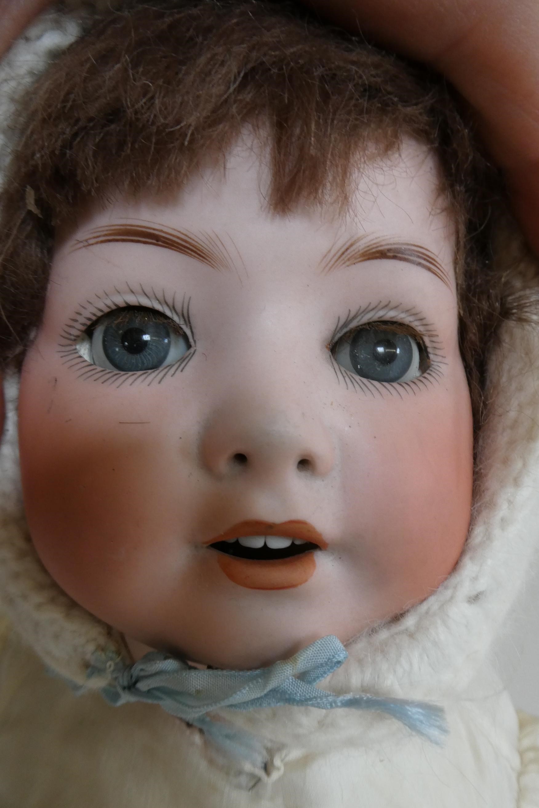 Two bisque socket head dolls Image