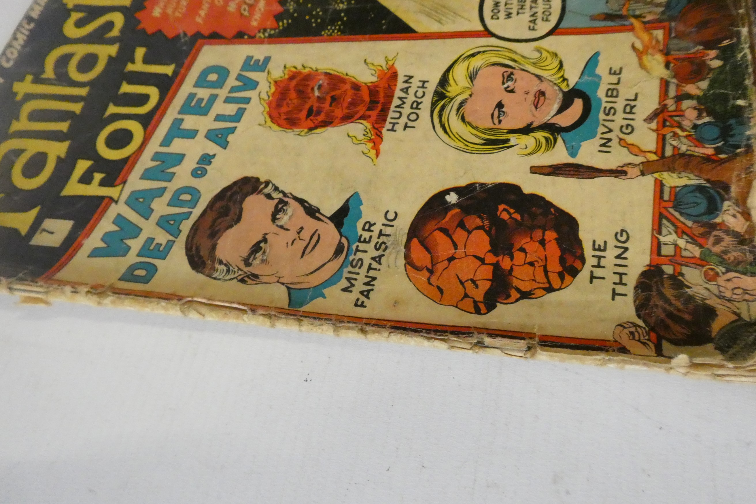 Marvel's Fantastic Four no. 7, 10, 15 and 20, all priced 9d, all in poor condition with rips, Image