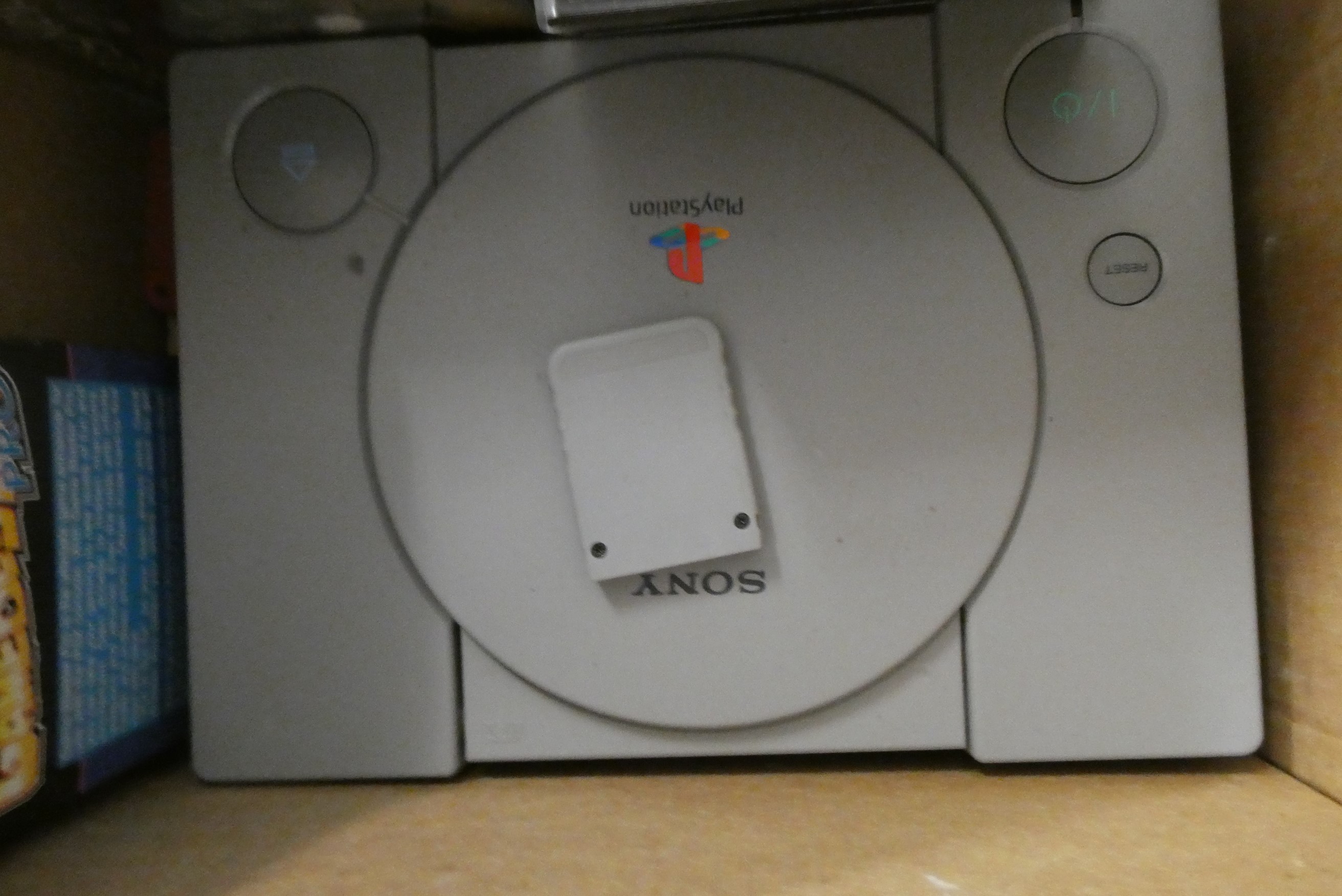 Playstation with controllers and 28 boxed games Image