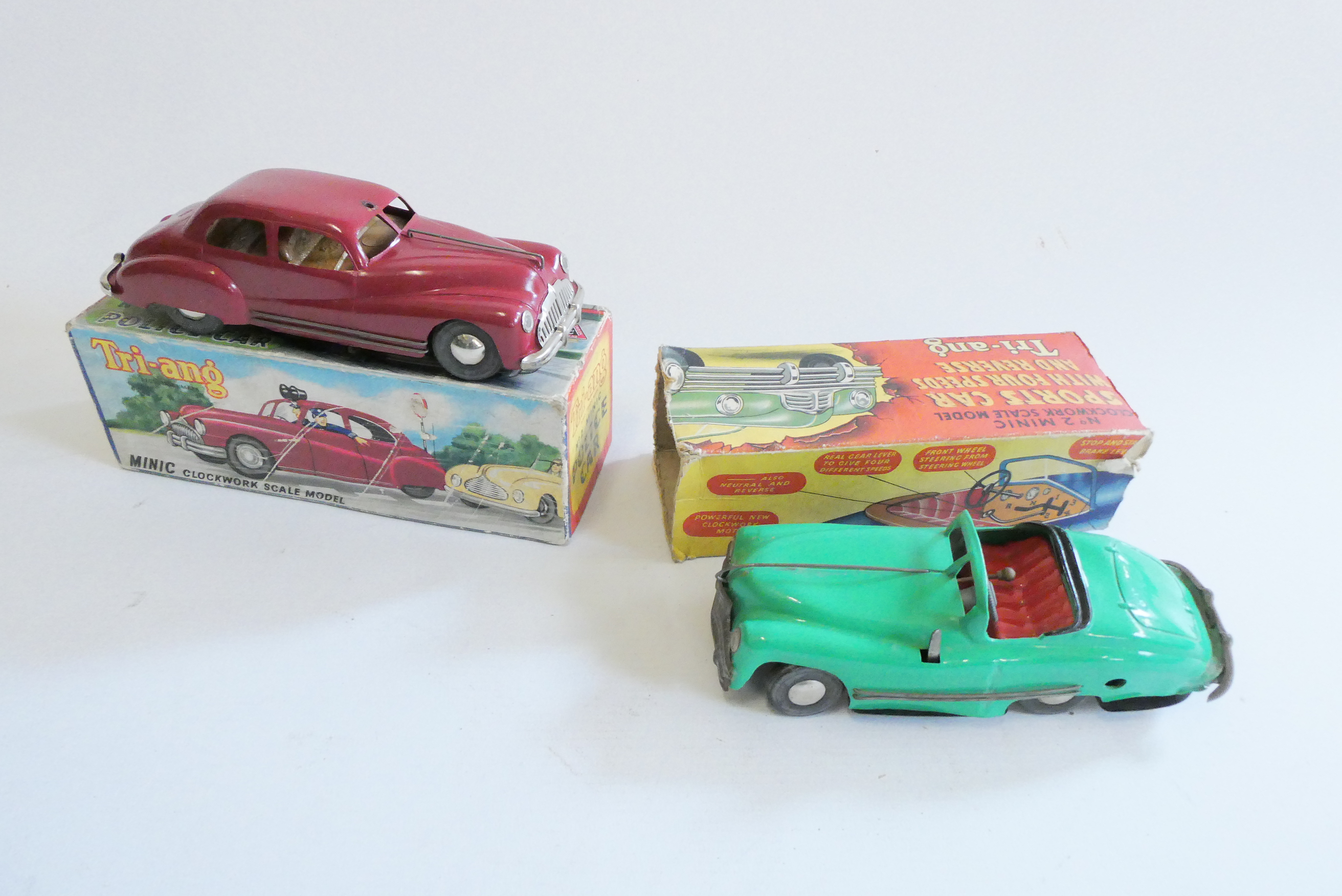 Triang Minic No2 Police car in maroon, bell missing, boxed, fair and No2 Minic Sports car in green, Image