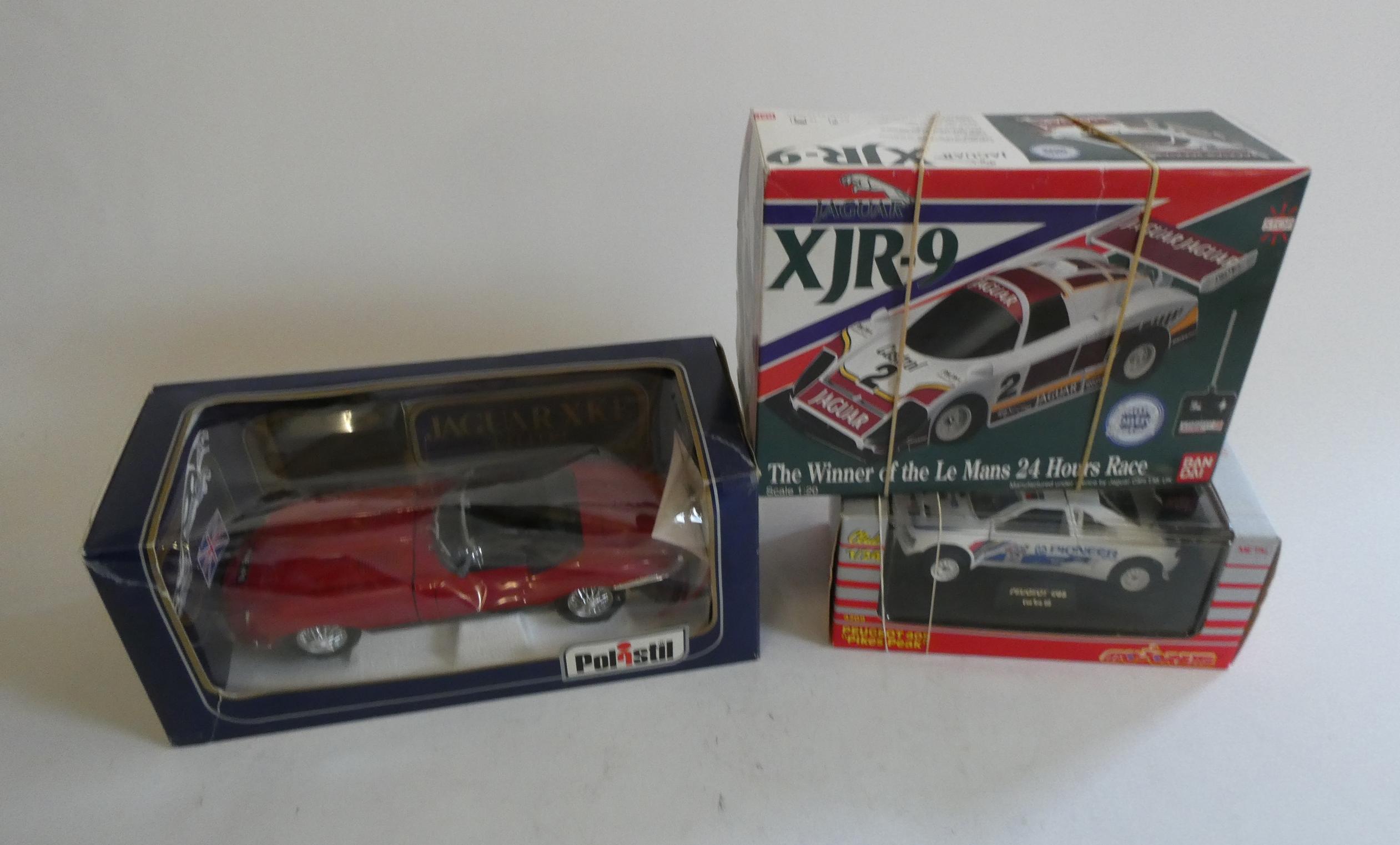 Radio Controlled Jaguar XJR-9, Polistil E type and Majorette Peugeot 405, all items boxed (Est. plus Image
