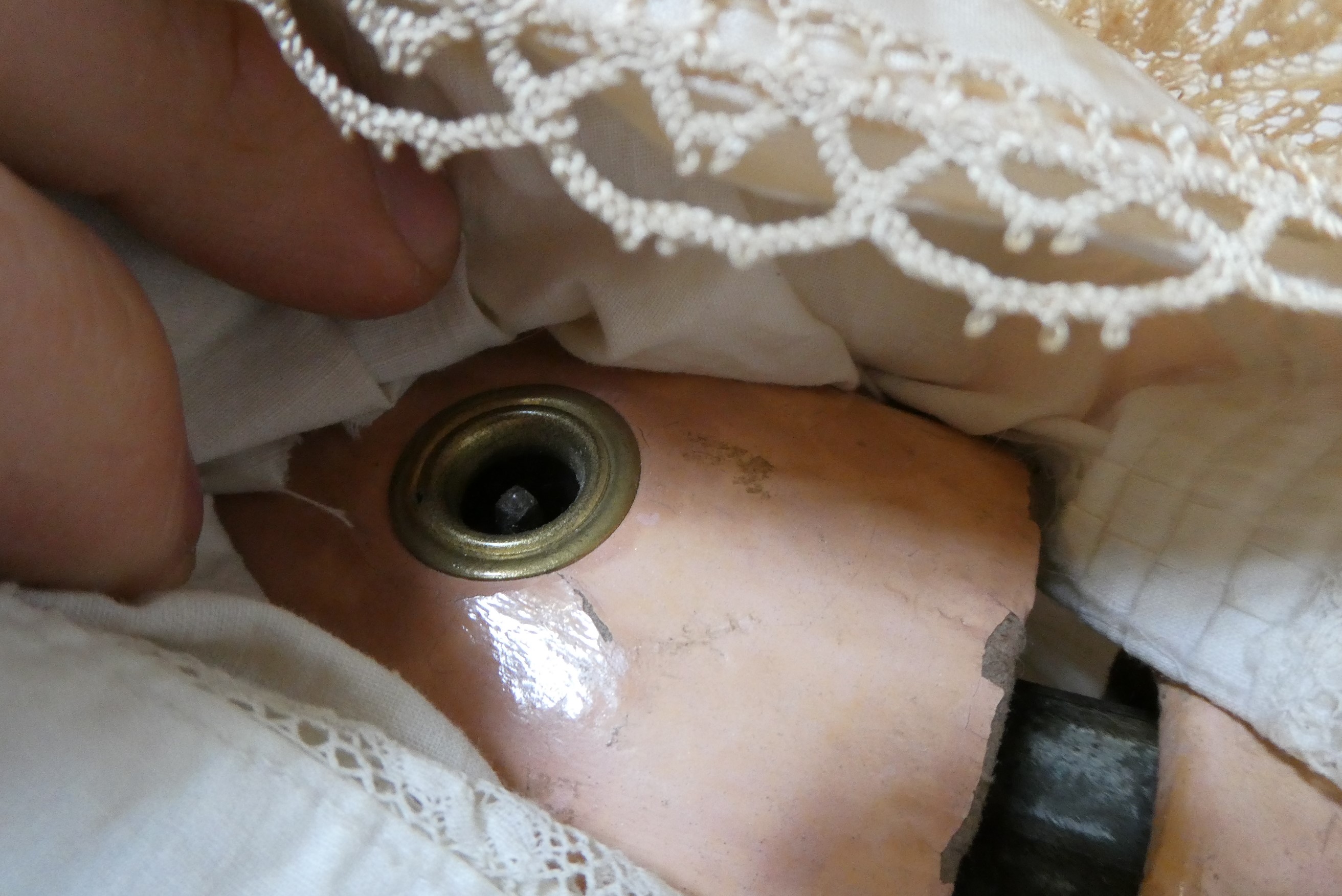 A Simon & Halbig bisque socket head clockwork walking doll with blue glass sideways glancing flirty Image