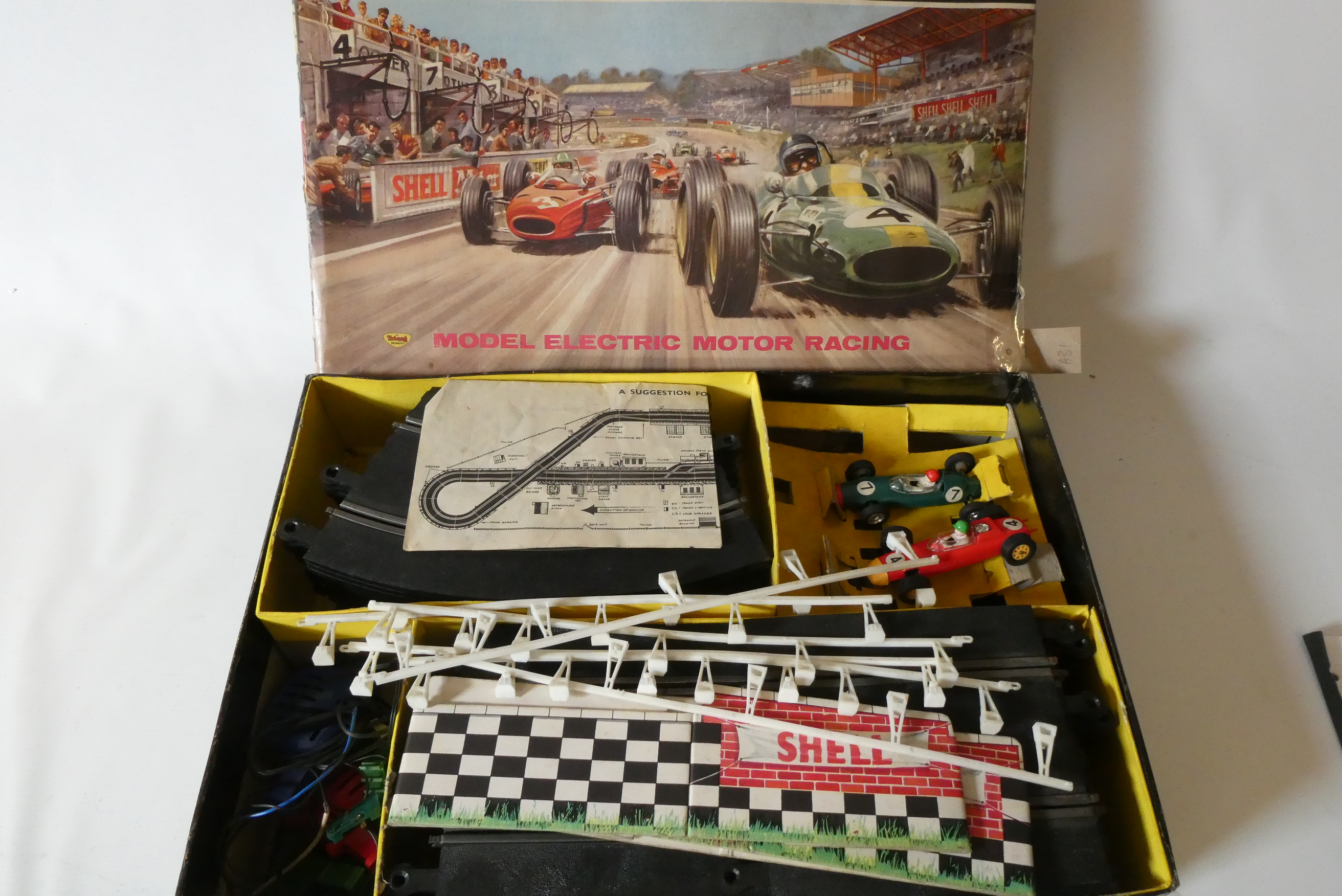 Scalextric Motor racing Set No 50 track with two cars, fencing and bridge, box at fault, fair (Est. Image