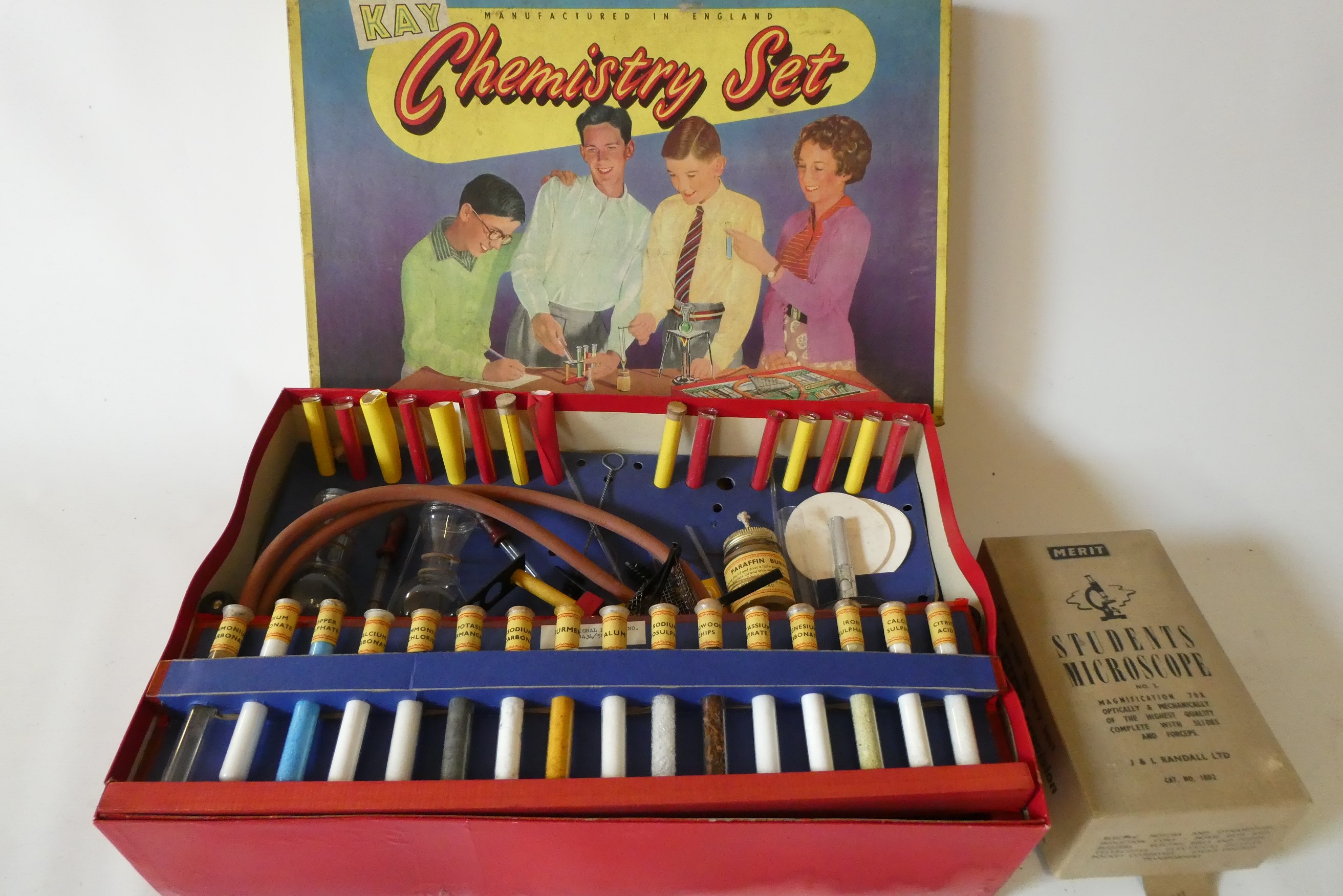 Kay Chemistry Set with 16 chemicals and laboratory equipment and a small Merit student microscope, Image