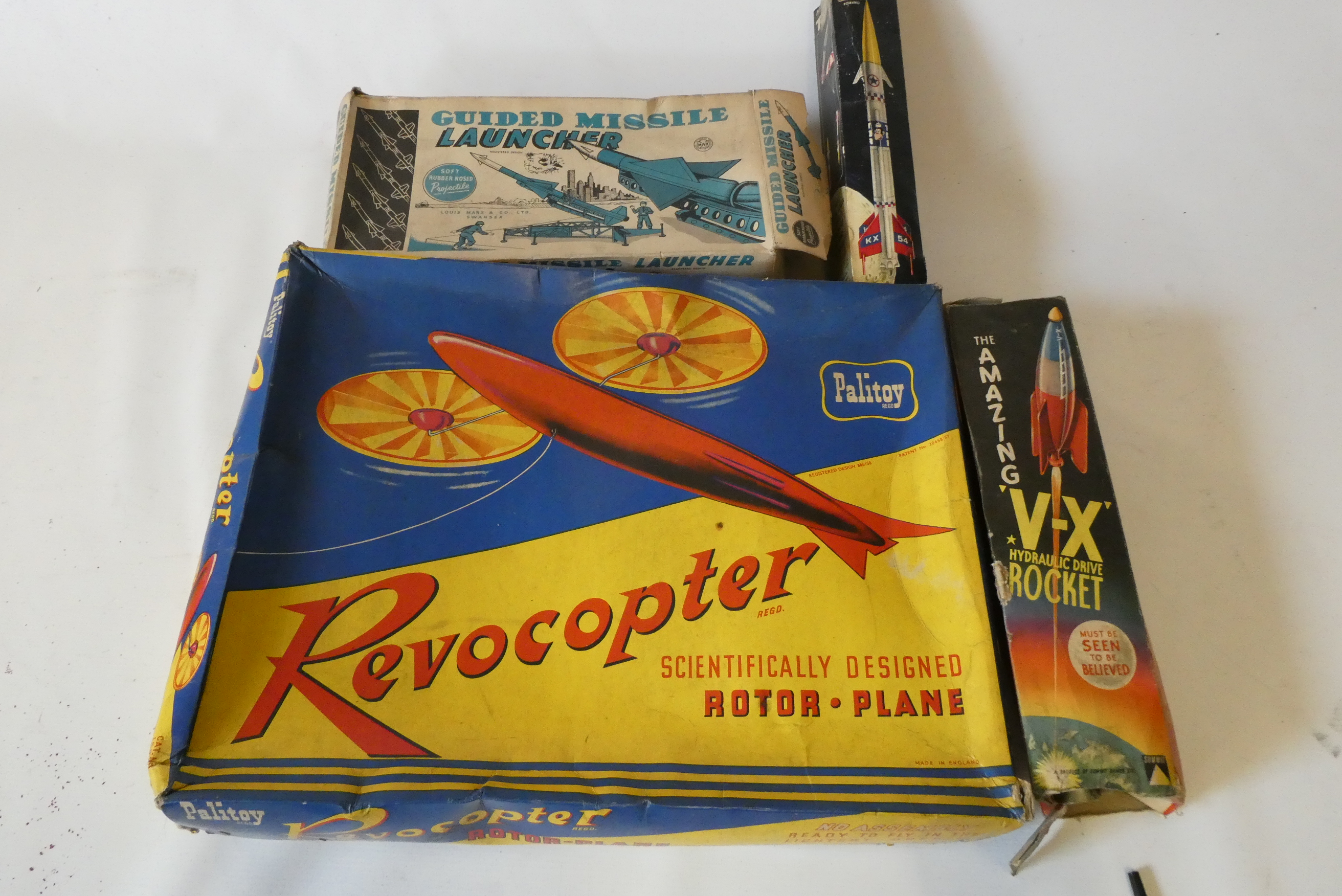 Space and rocket toys comprising the X hydraulic drive rocket spring powered guided missile launcher Image