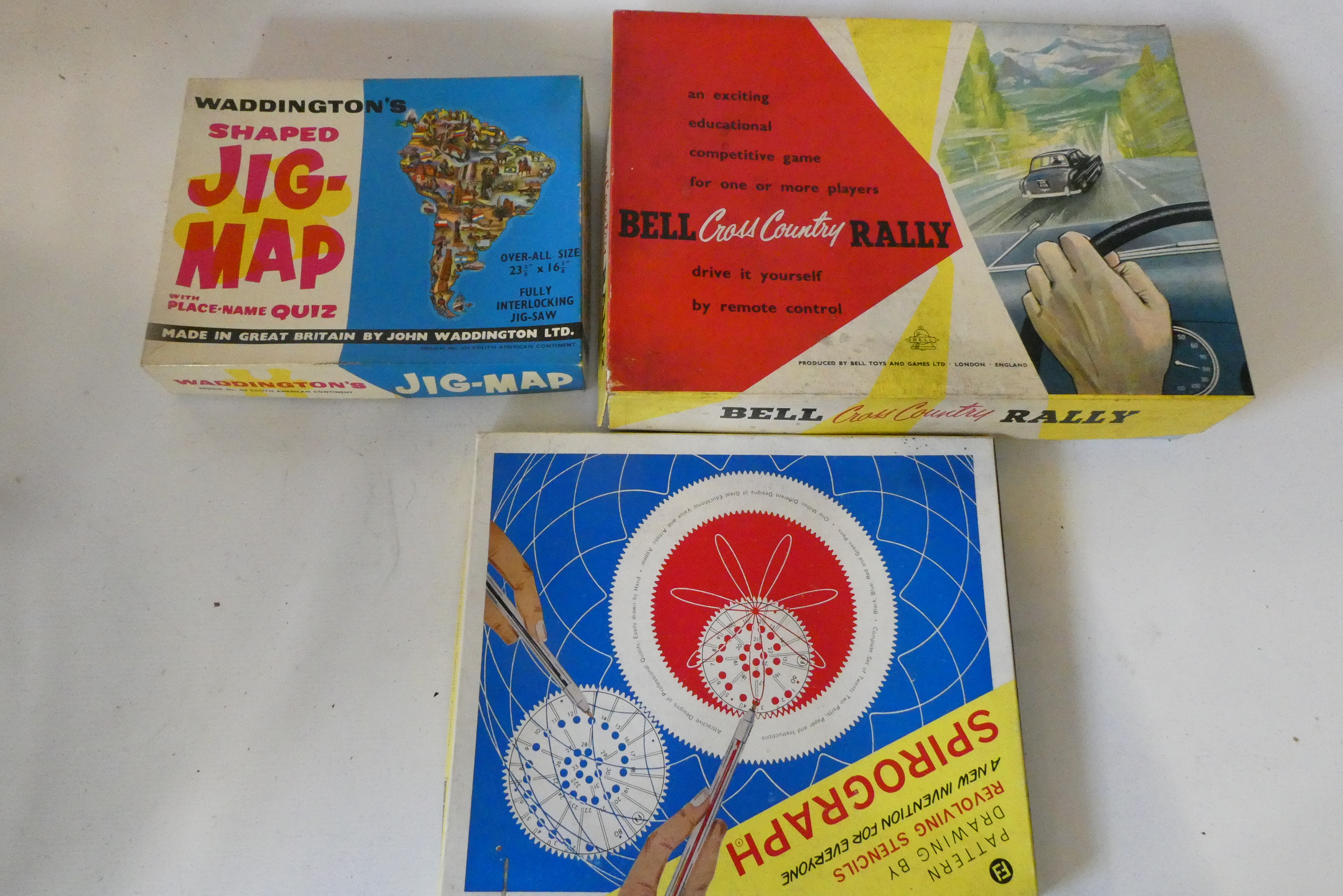 Childrens board games and toys including Bell Cross Country, Rally Whacko Word Play, shaped jigsaw Image