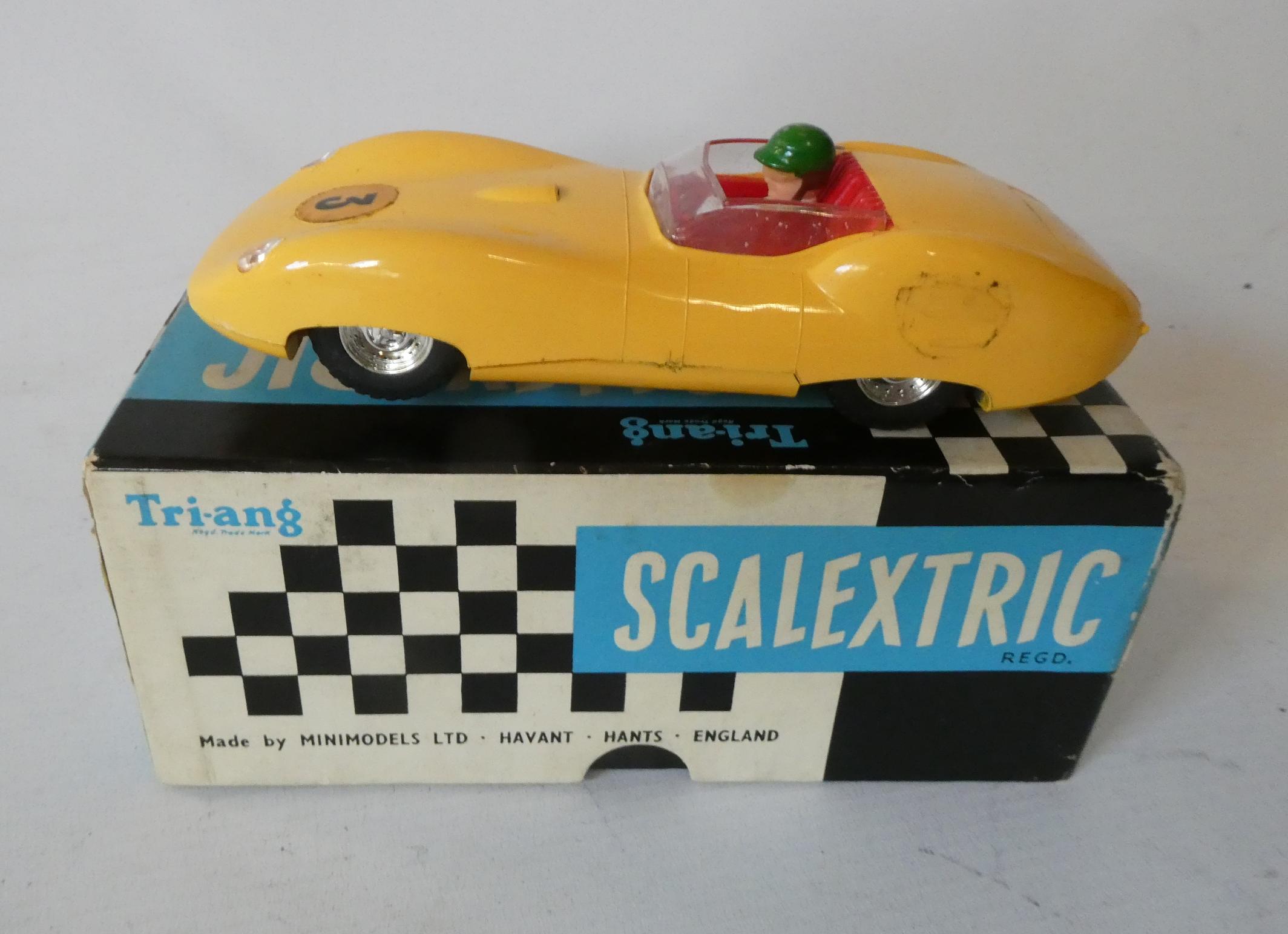 Scalextric Lister Jaguar race car finished in yellow, boxed, good (Est. plus 24% premium inc. VAT) Image