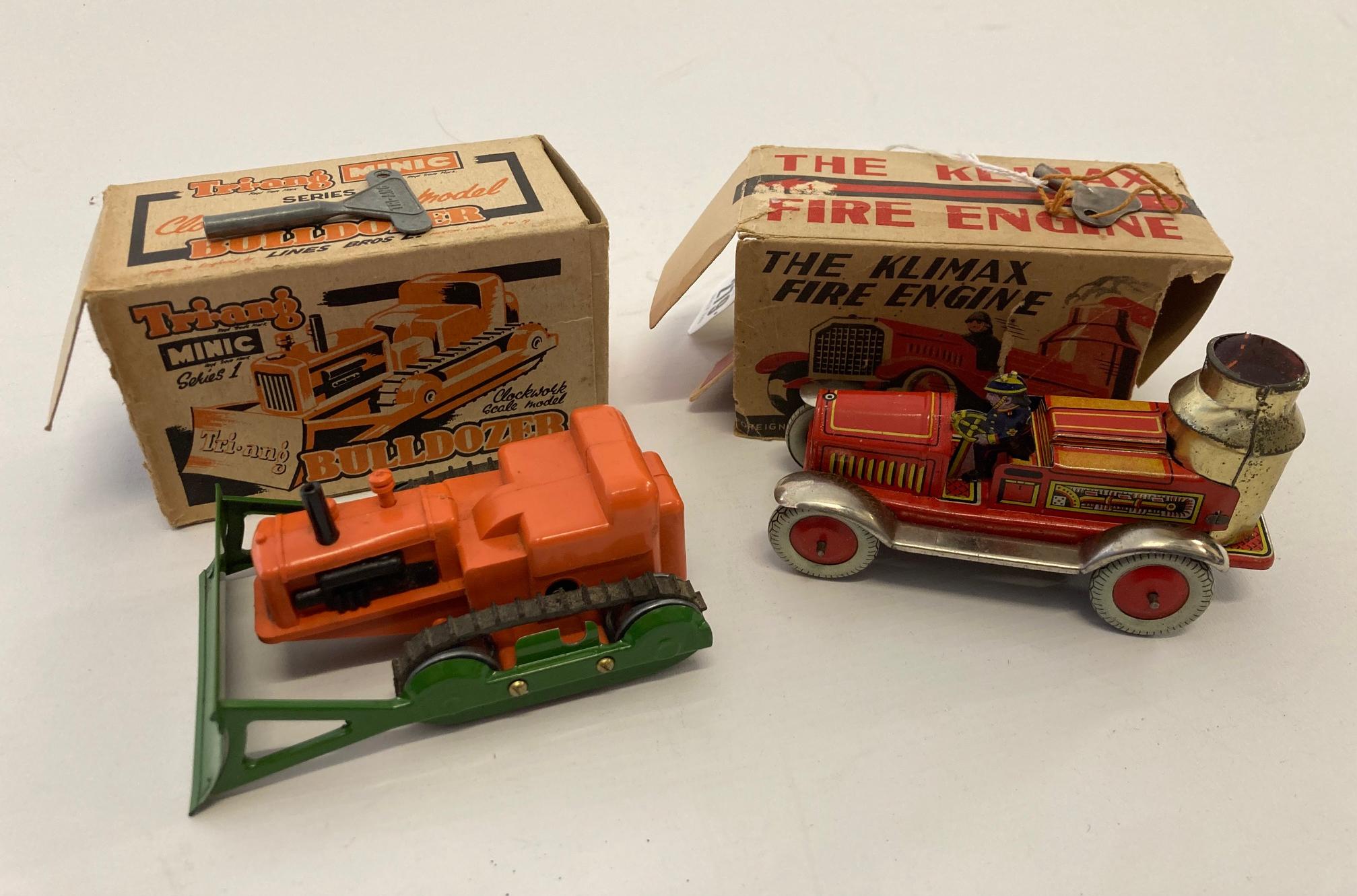 Triang Minic Series 1 clockwork bulldozer and small Kilmax tin fire engine, both boxes faulty, fair Image
