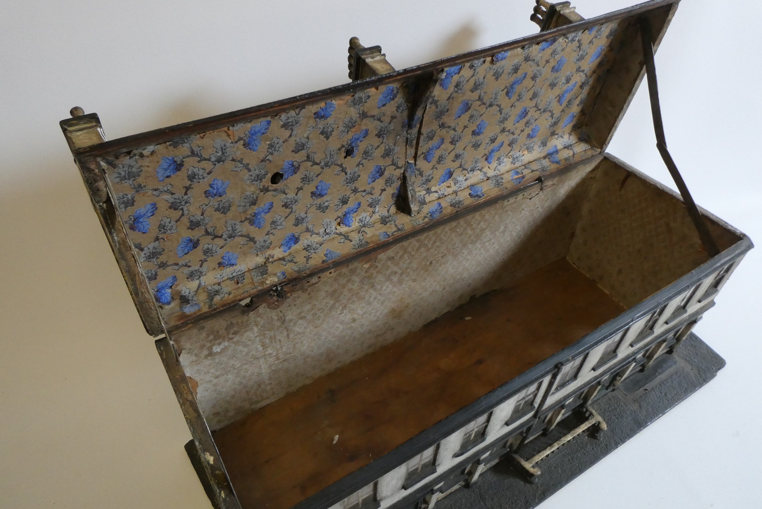 A Victorian doll's house/trunk in the form of a two house street Image