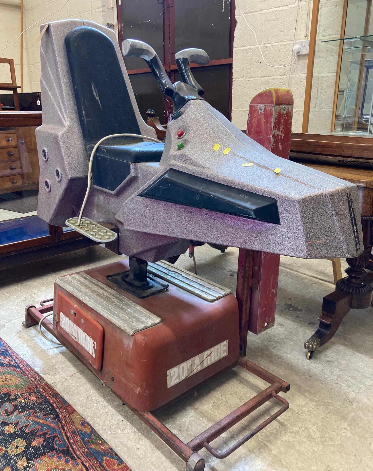 A child's ride on rocket ship Image