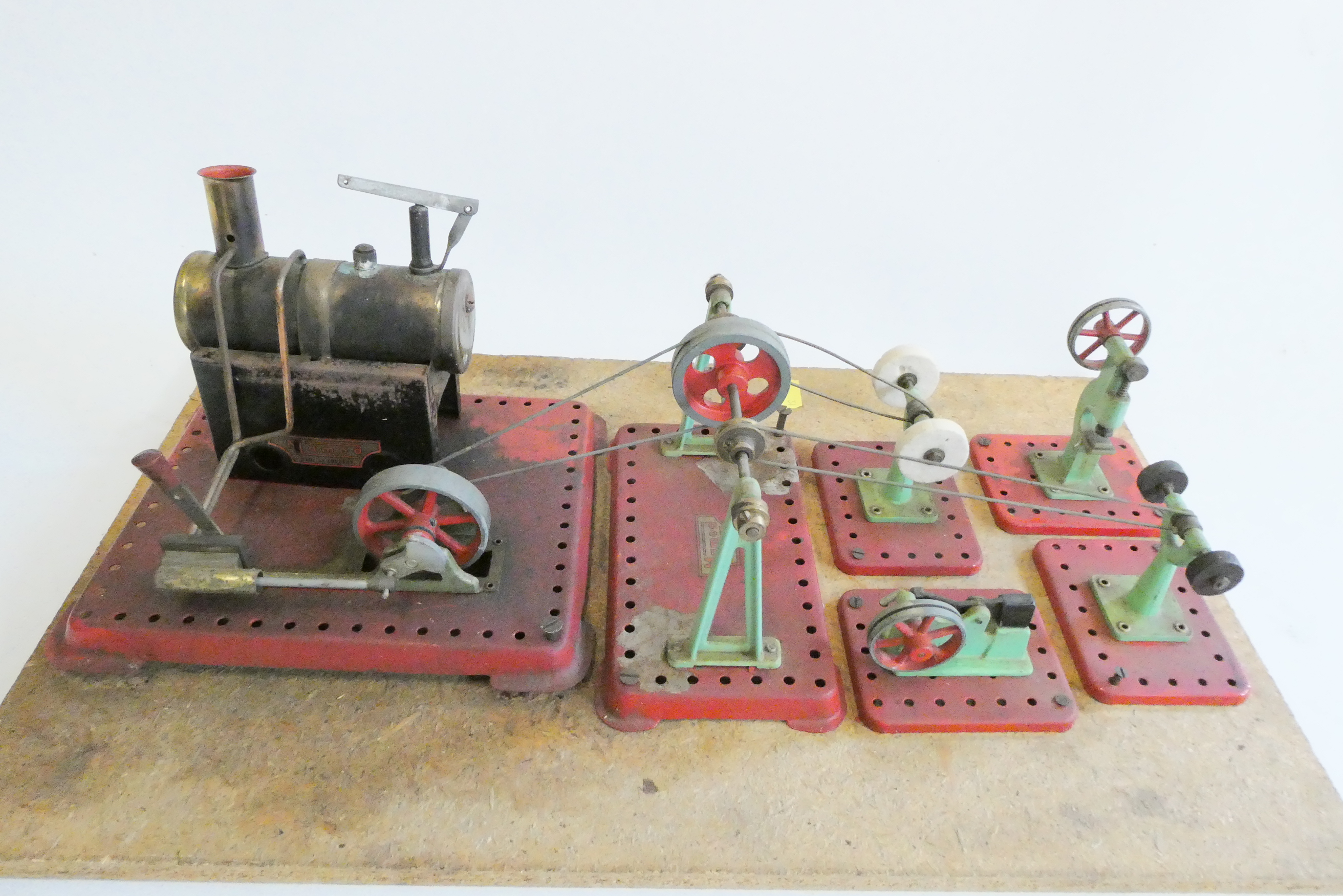 Mamod SE2a steam engine, line shaft and workshop machines affixed to wood base, some scorching and Image