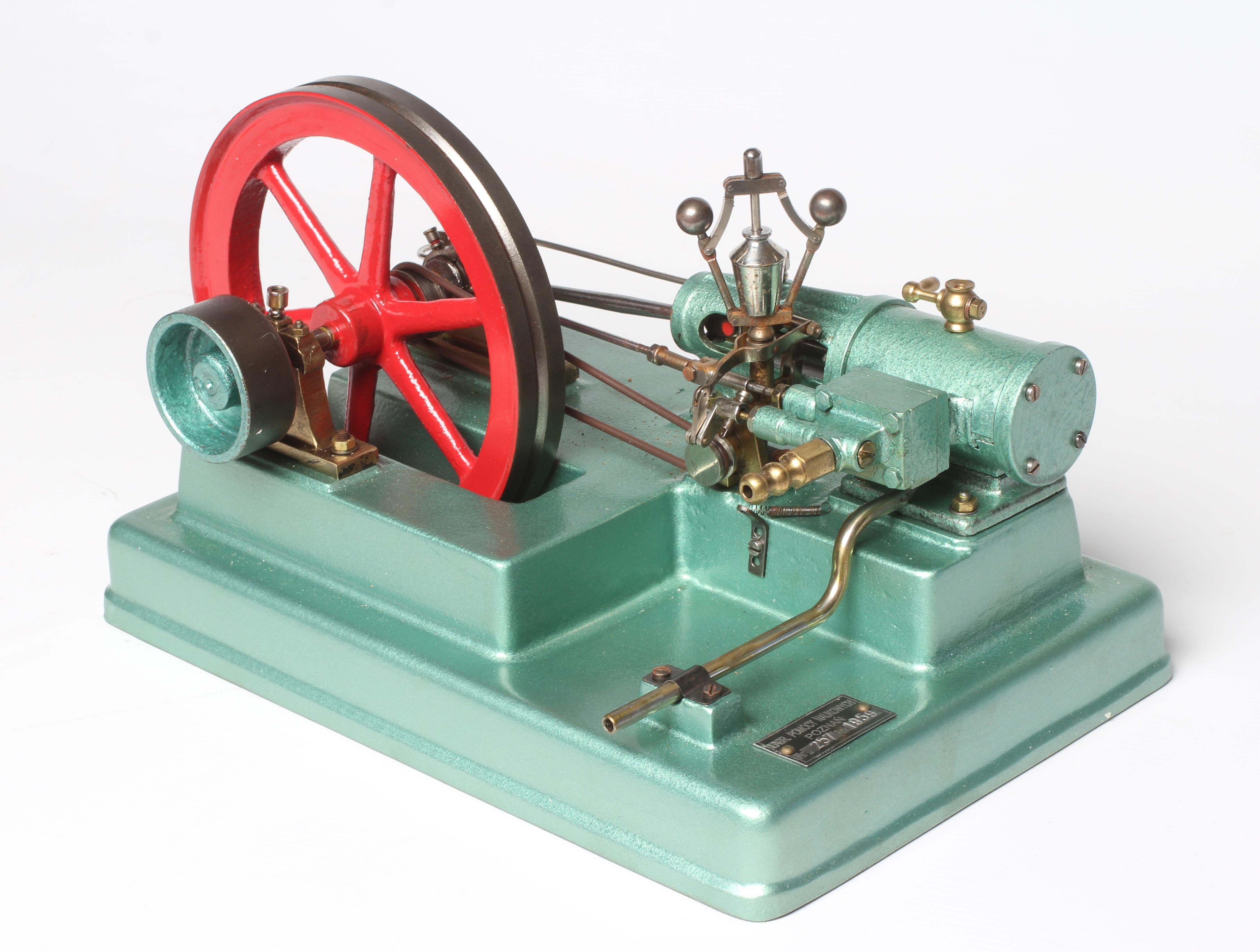 Polish made horizontal steam engine, single cylinder with working governor, on cast base 6" fly Image