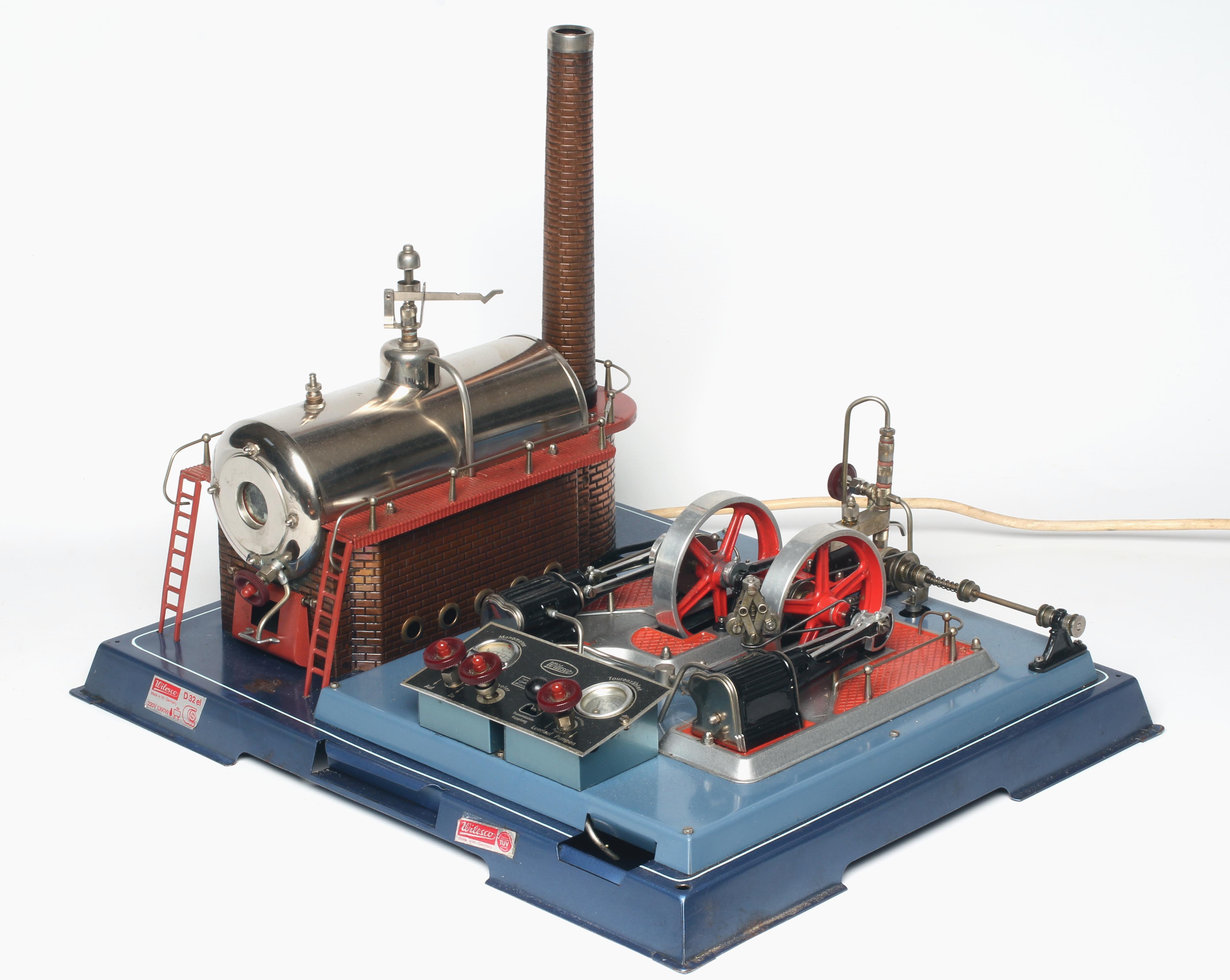 Wilesco D32 electrically fired twin cylinder stationary steam engine with dummy regulator and water Image